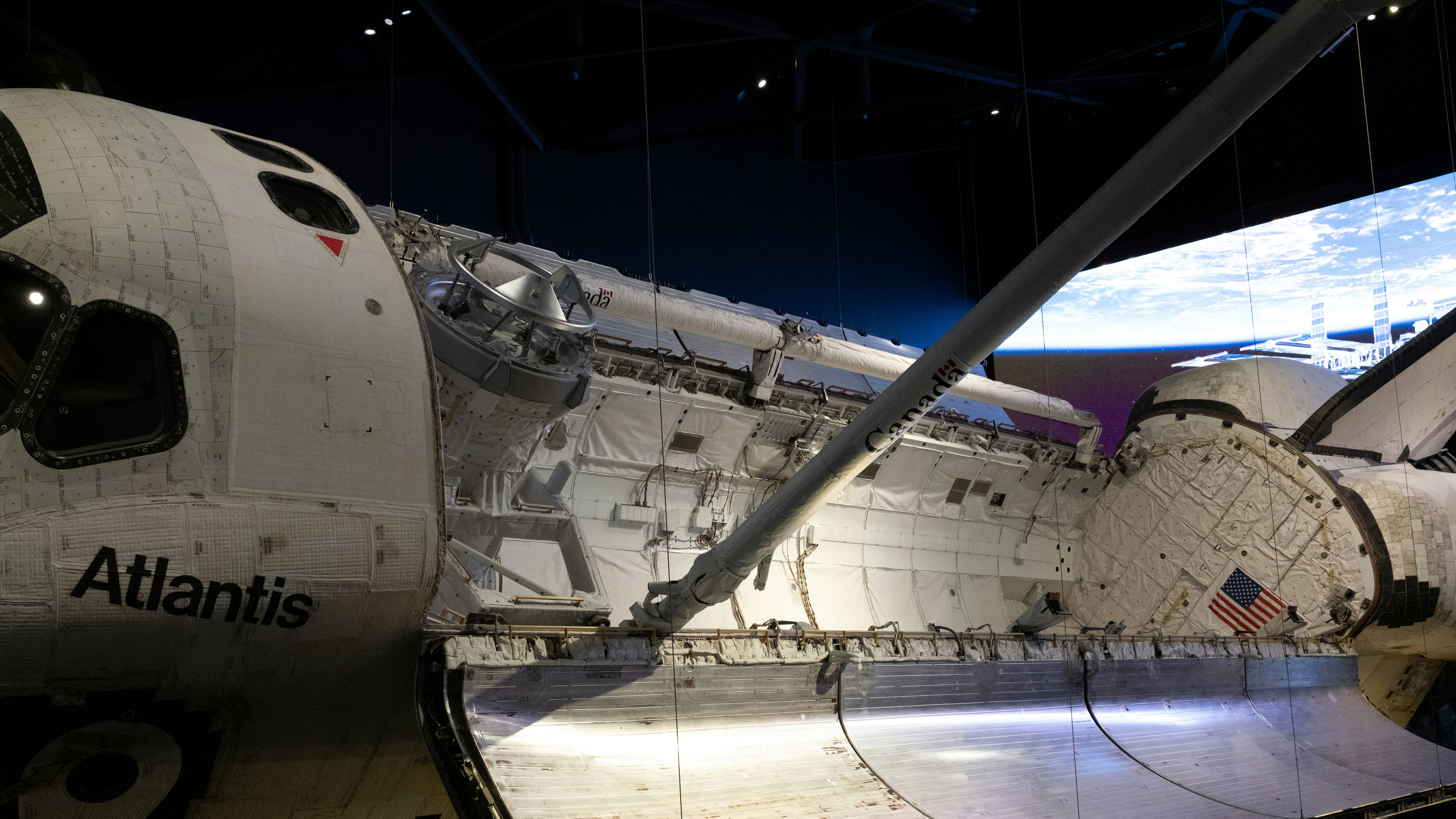 A space shuttle is parked in a hanger