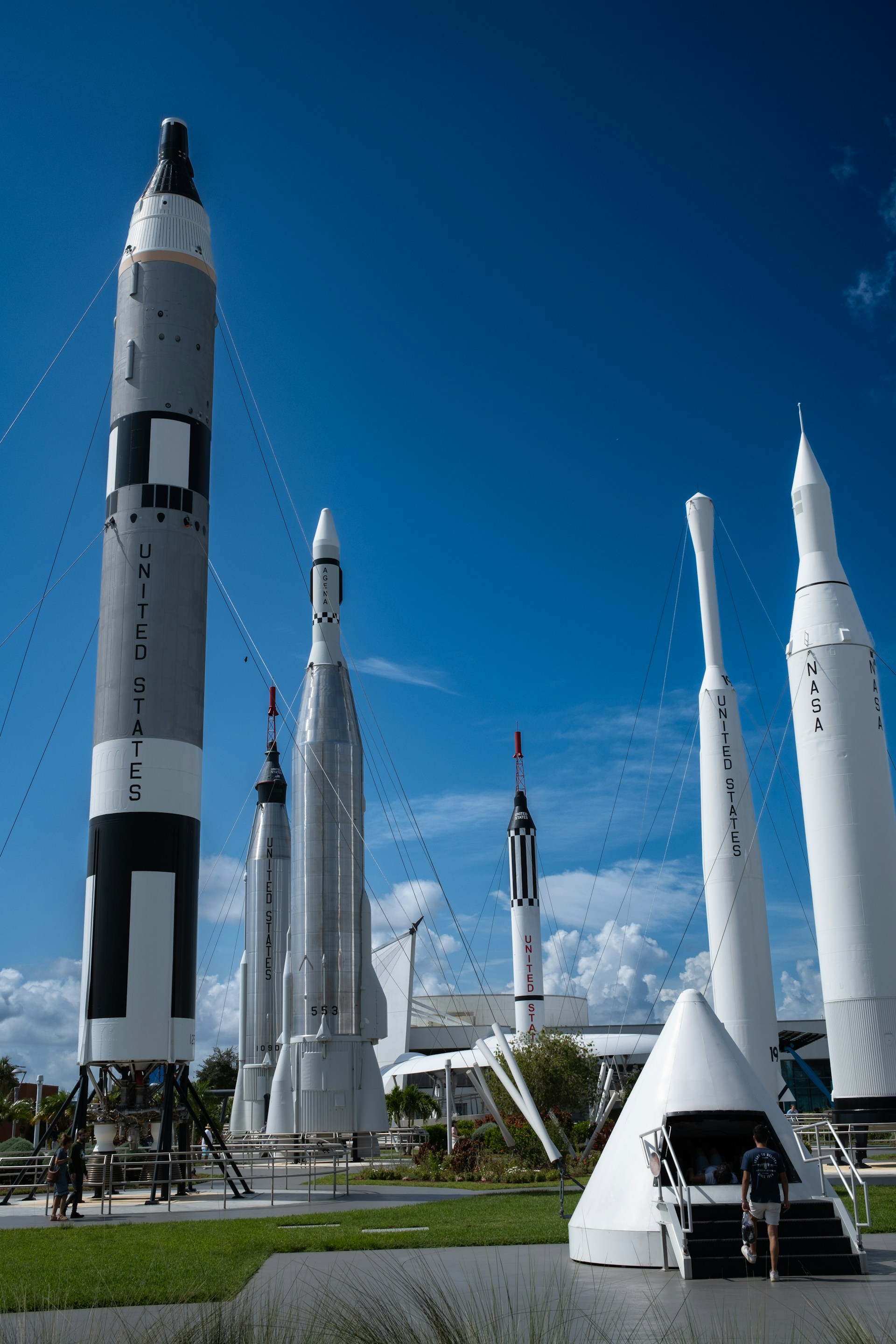 A group of rockets sitting on top of a field