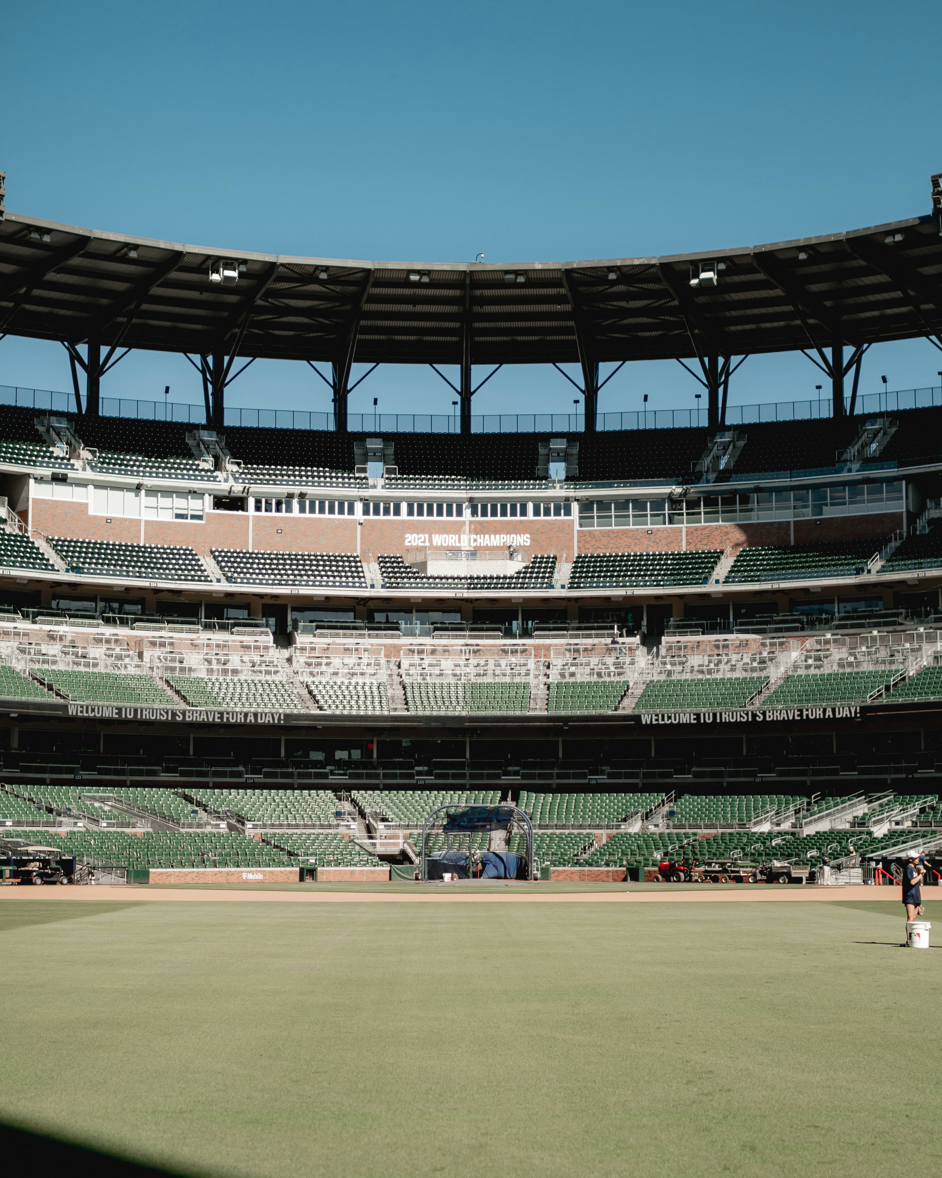A baseball field with a few players on it
