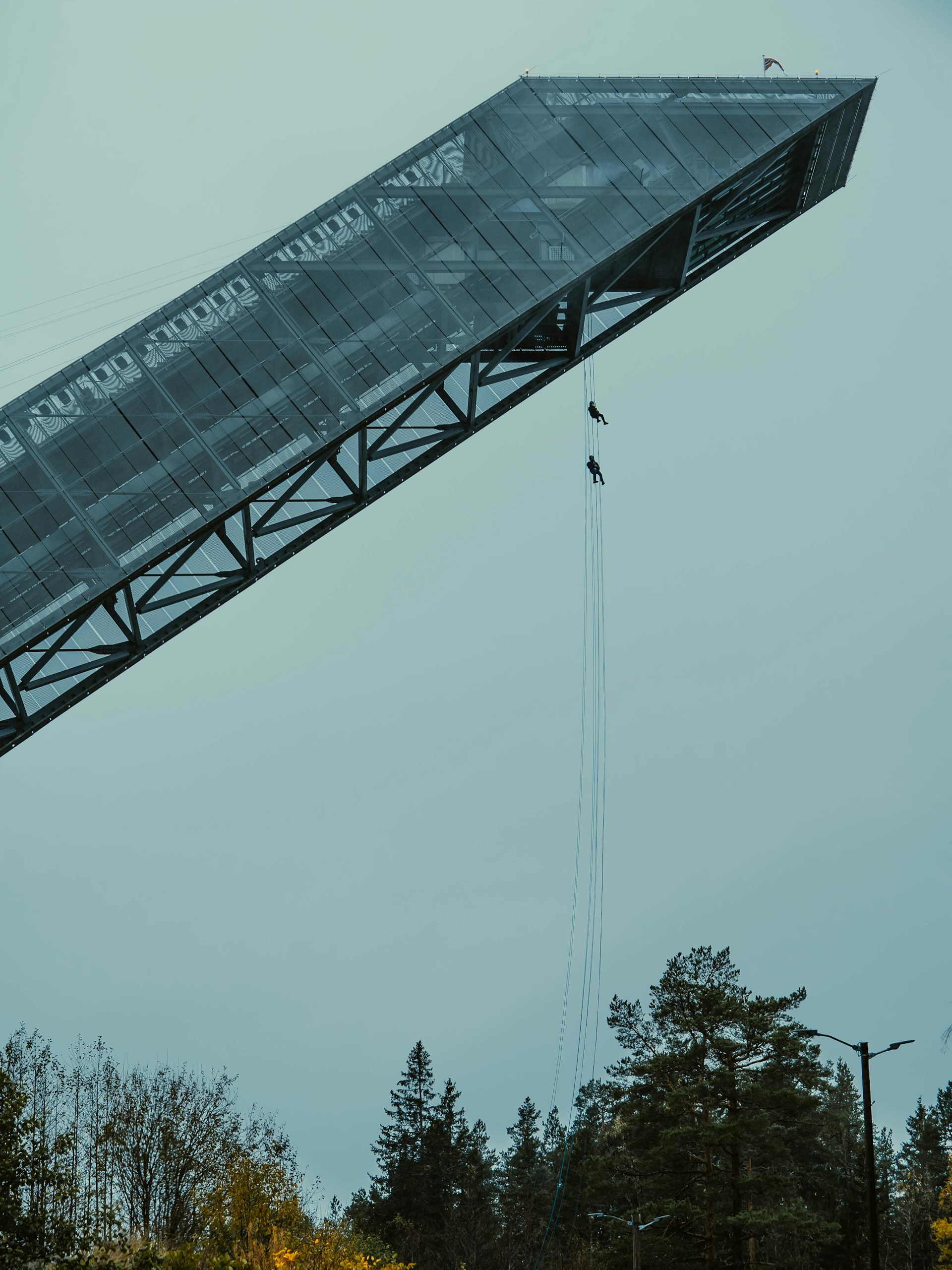 A large metal structure with a sky background