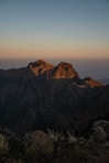 A view of a mountain range at sunset