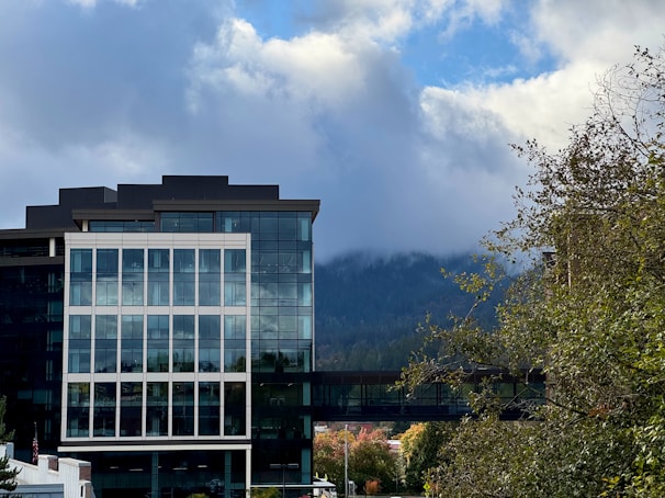 A large building with a lot of windows on the side of it