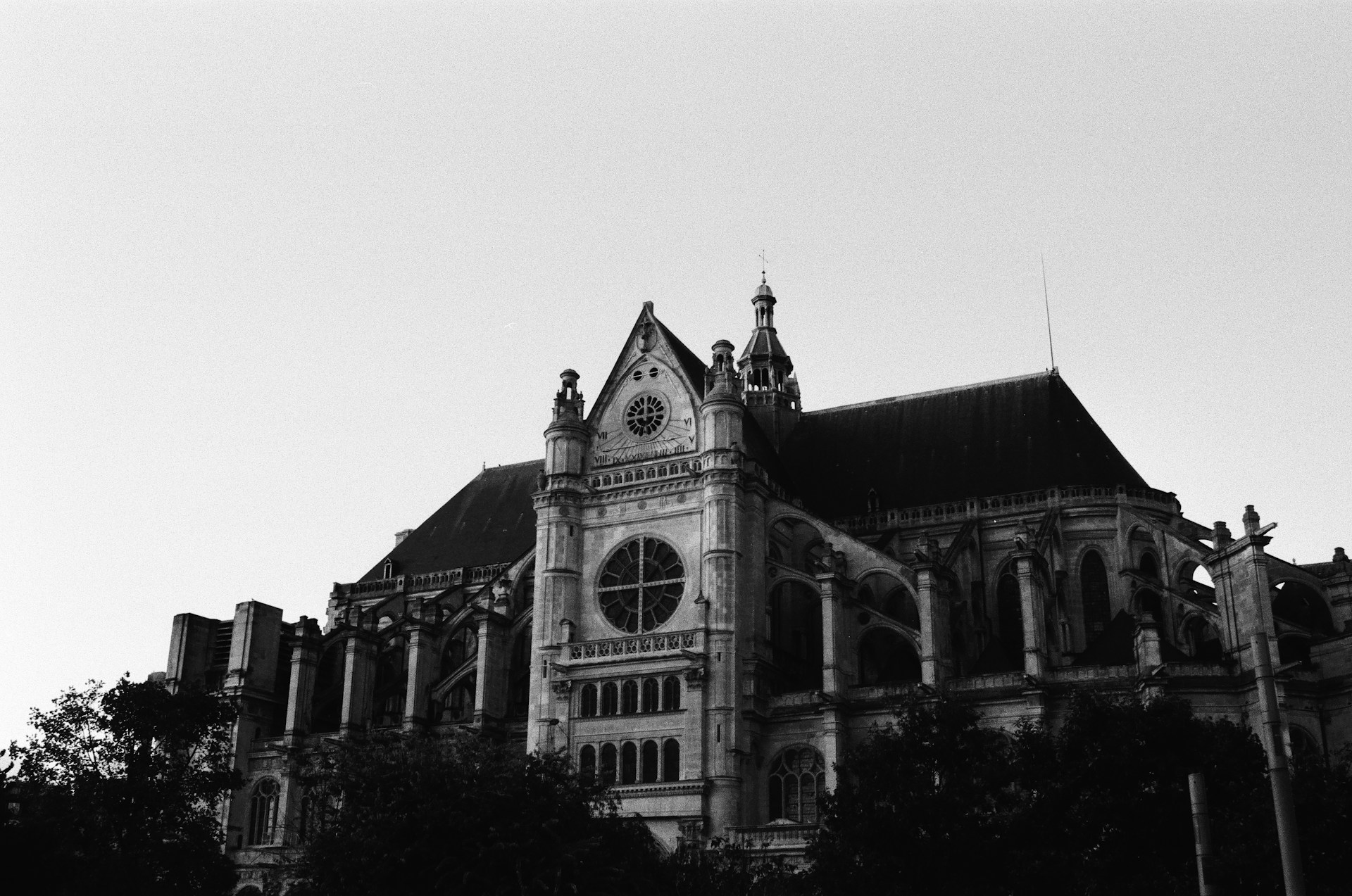 A black and white photo of a large building