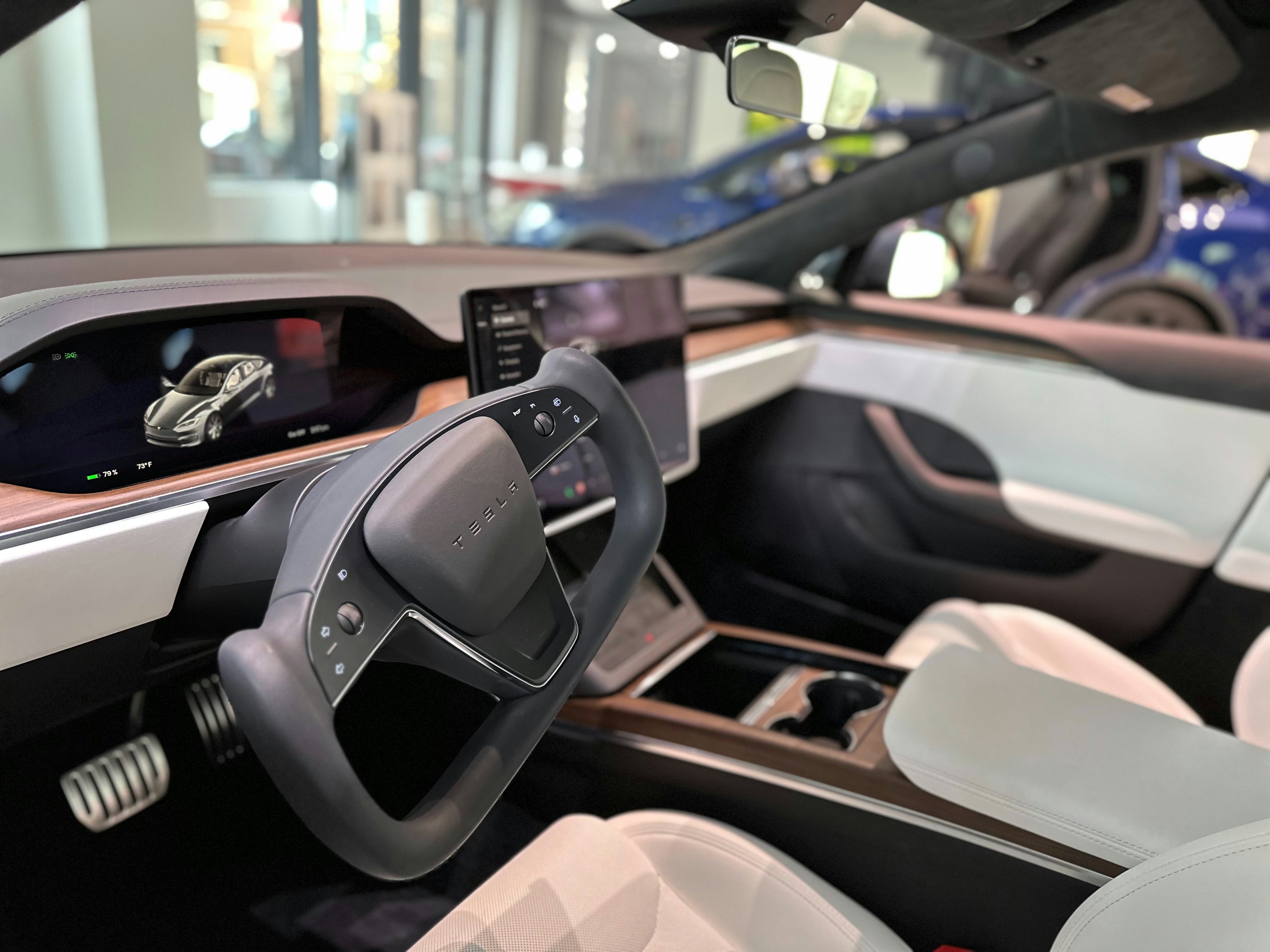 Electric car interior with a wide touchscreen and minimalist dashboard similar to the Nissan N7