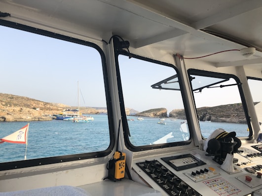 A view of the ocean from inside a ship