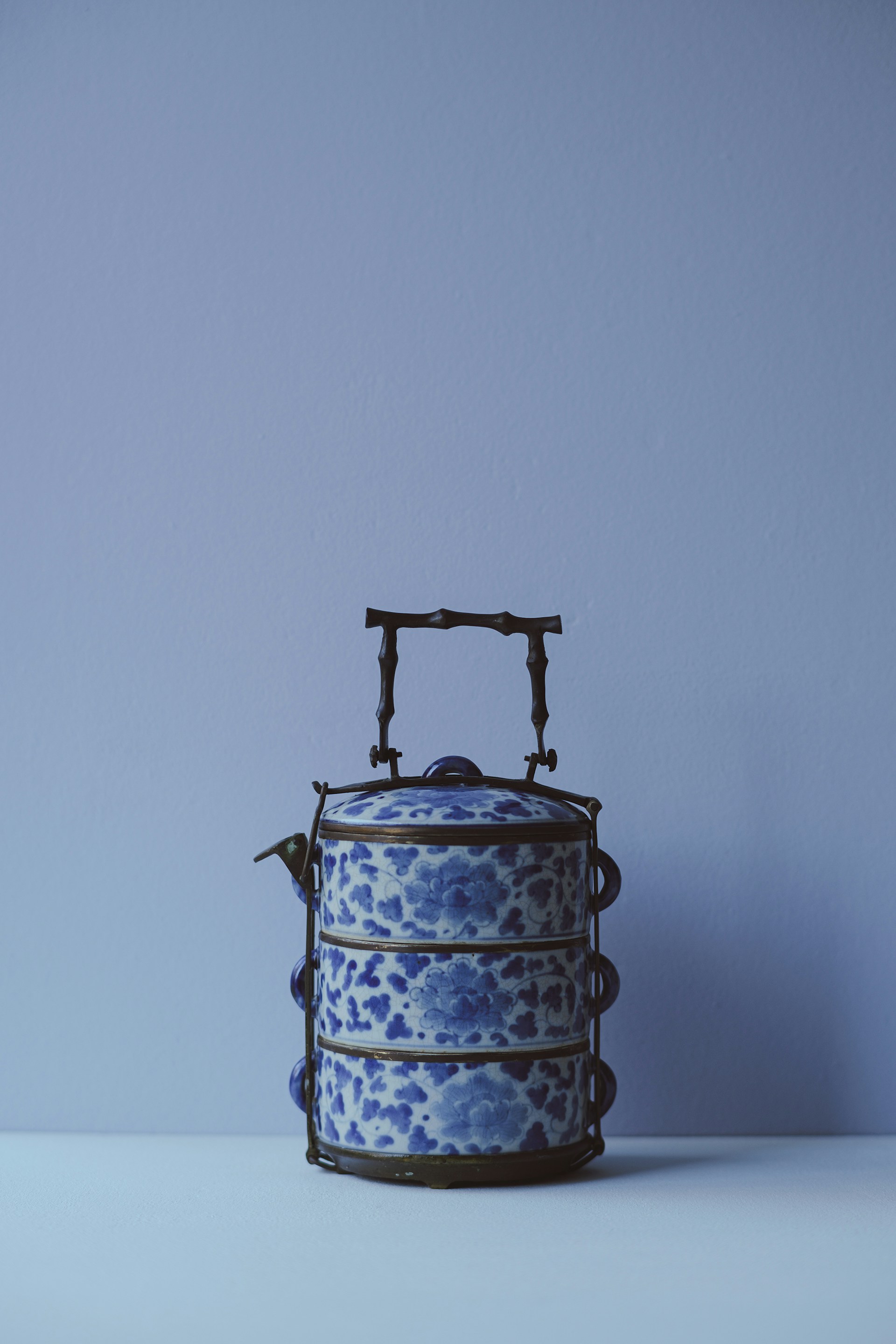 A blue and white container sitting on top of a table