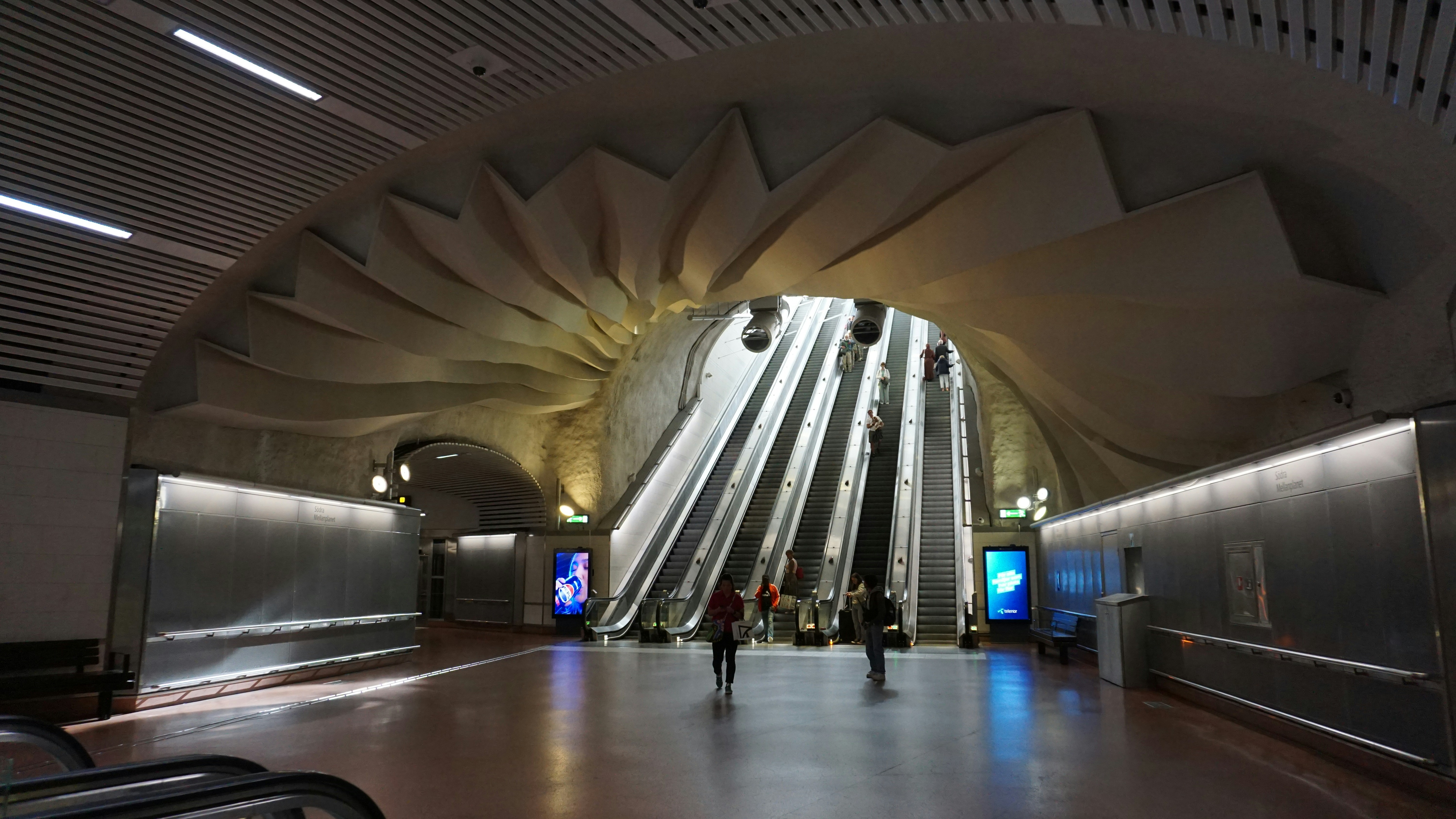 A very large building with a bunch of people inside of it