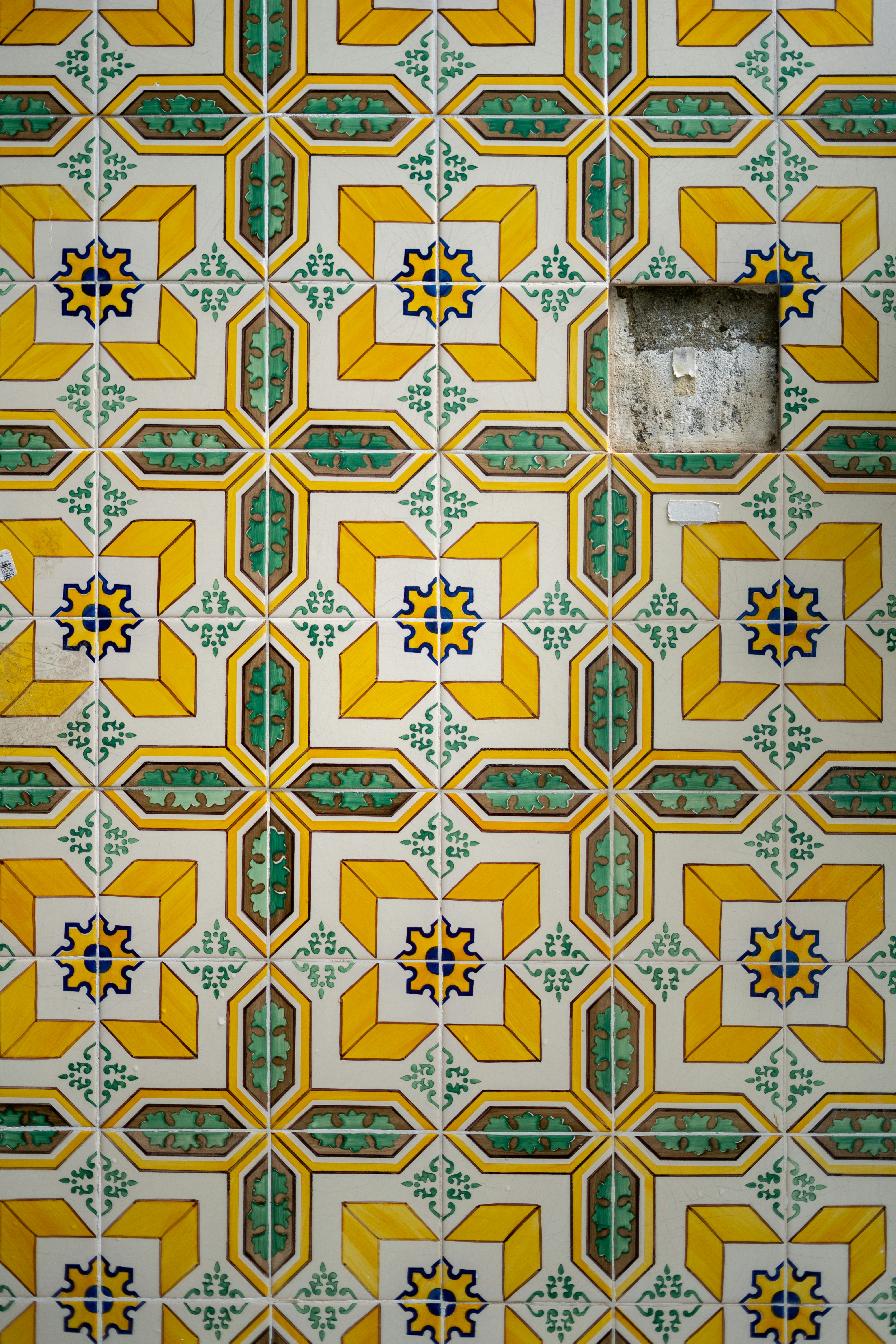 A close up of a wall with a pattern on it