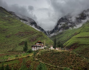 A house in the middle of a mountain range