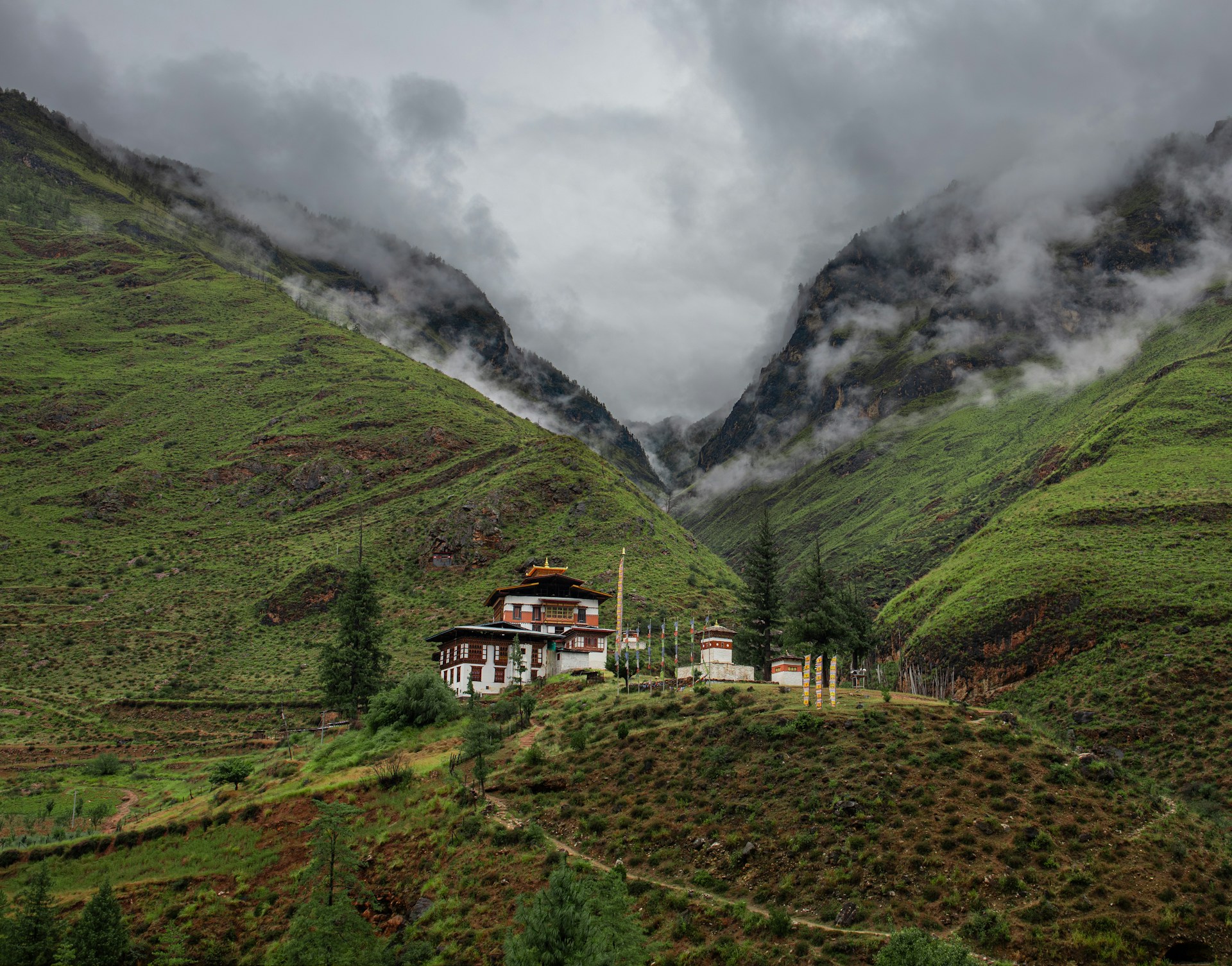 A house in the middle of a mountain range