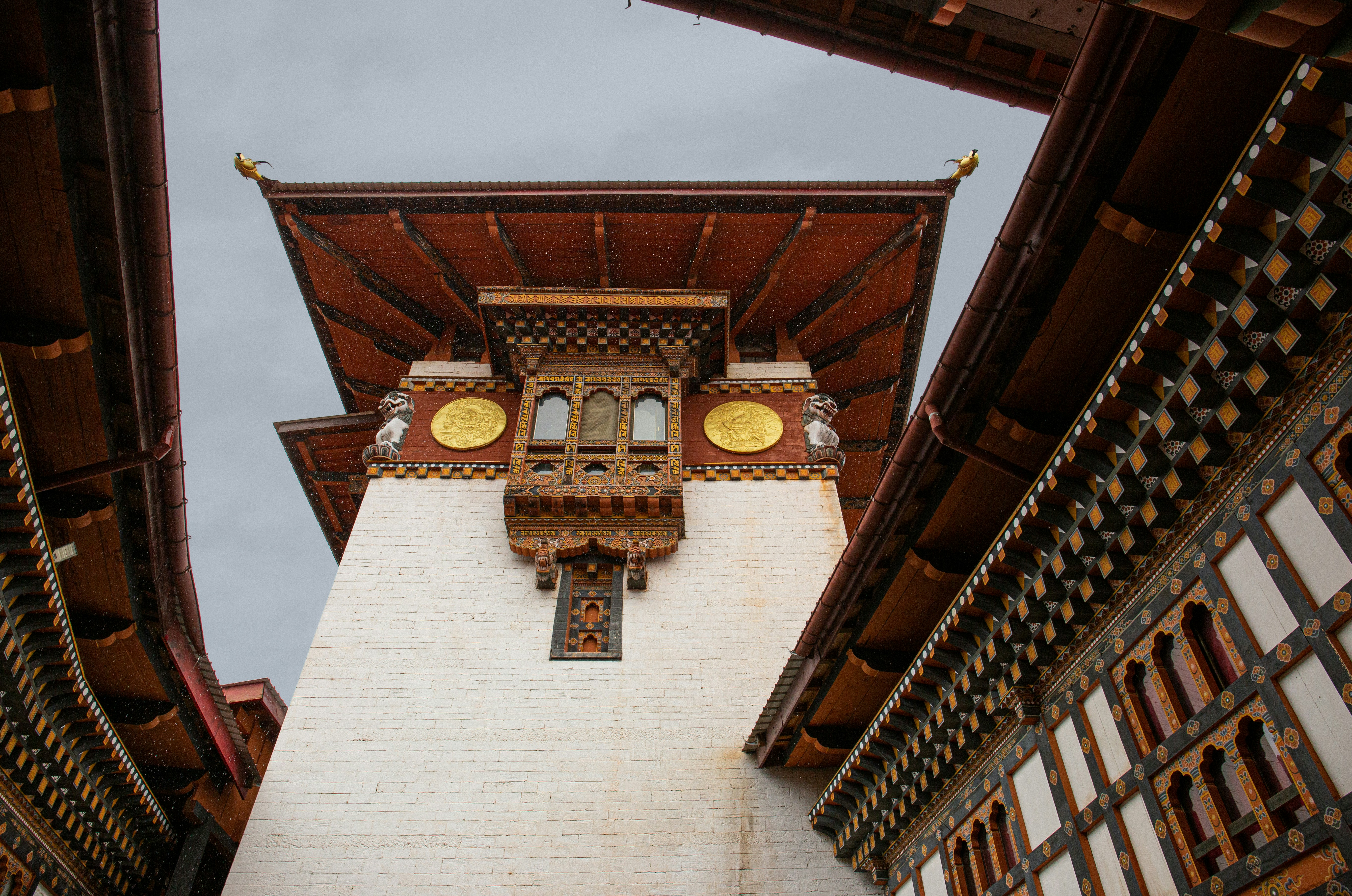 A tall building with a clock on the side of it