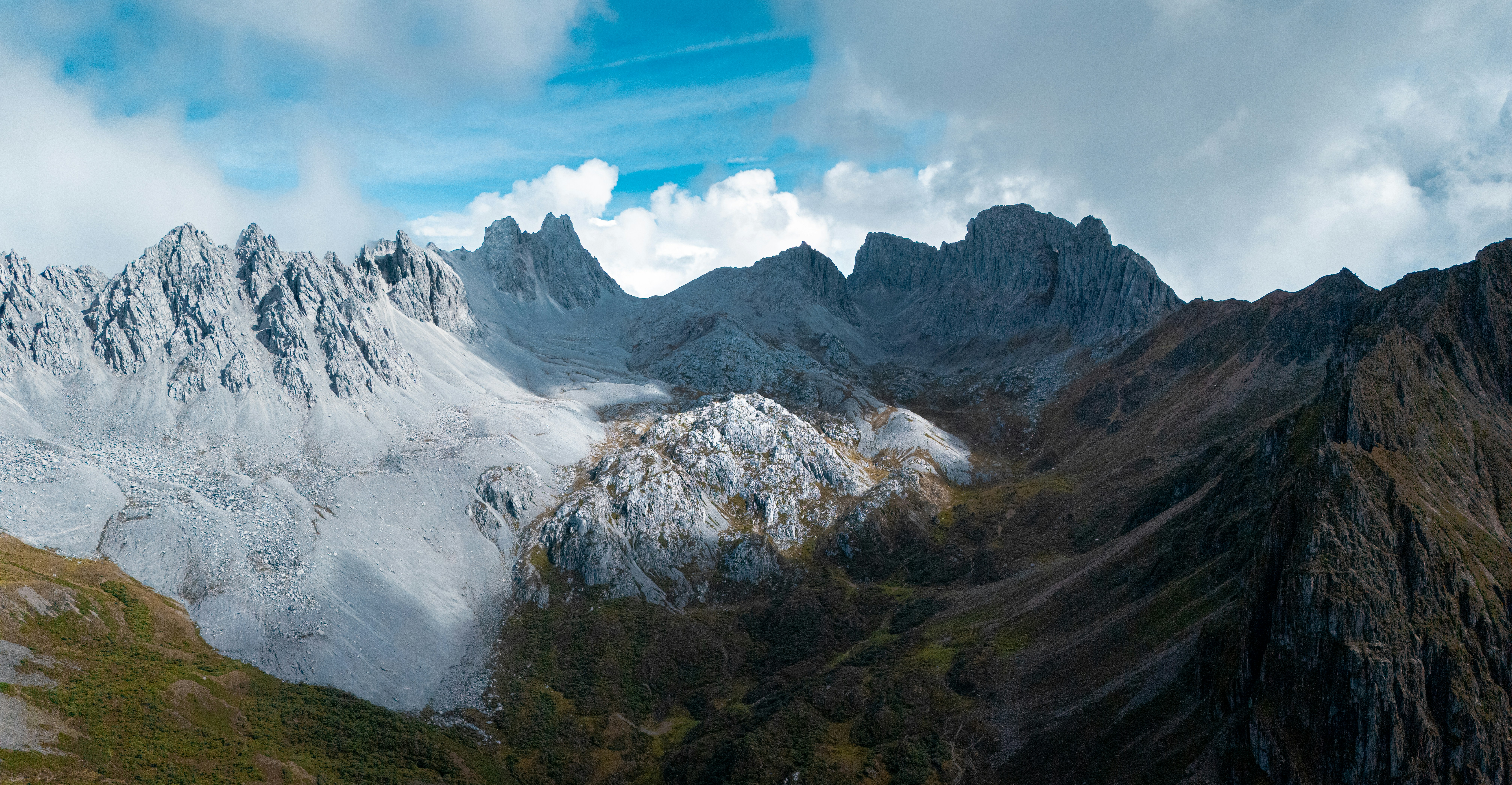 A group of mountains with snow on them