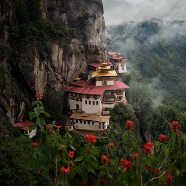A mountain with a building on top of it