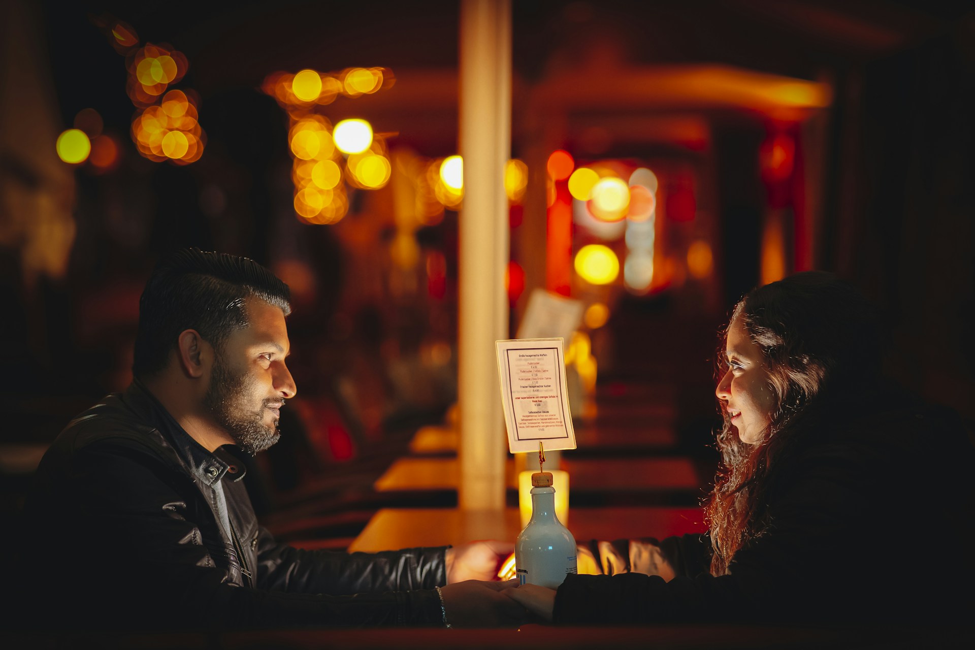 A man and a woman sitting at a table