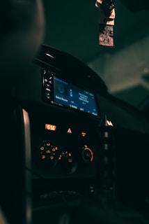 A view of the cockpit of a plane at night