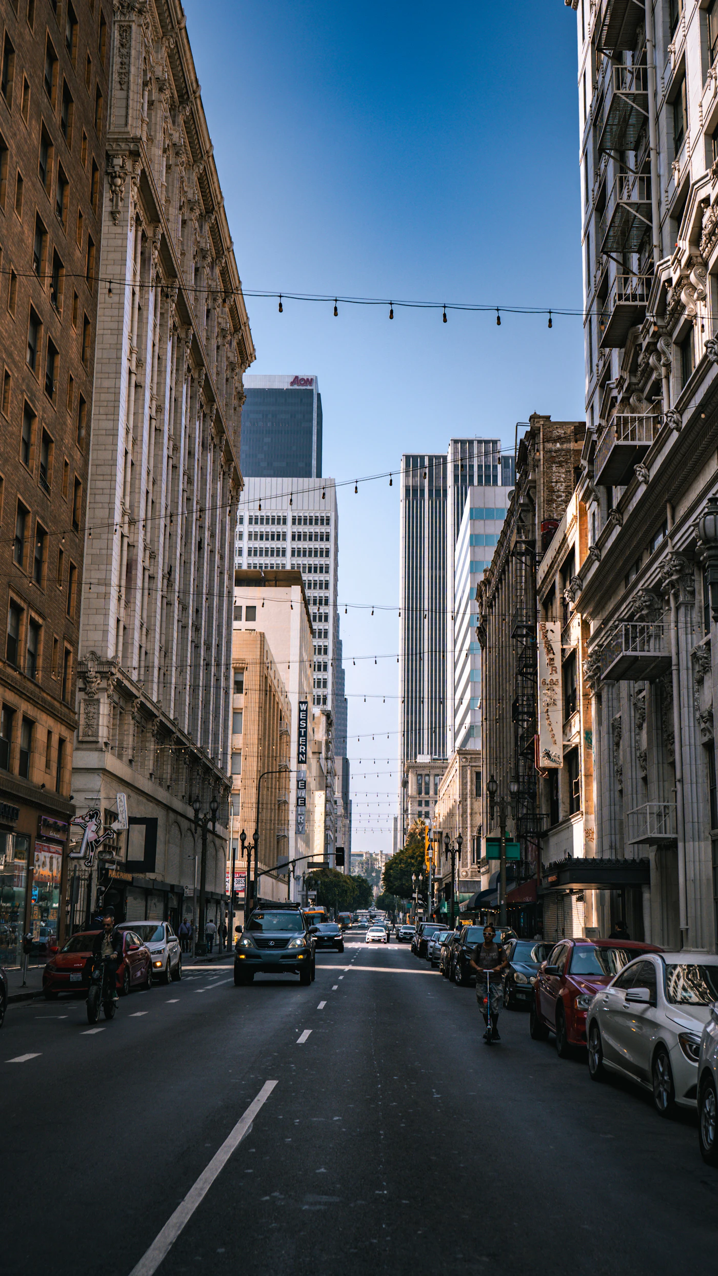 A downtown street lined with tall buildings