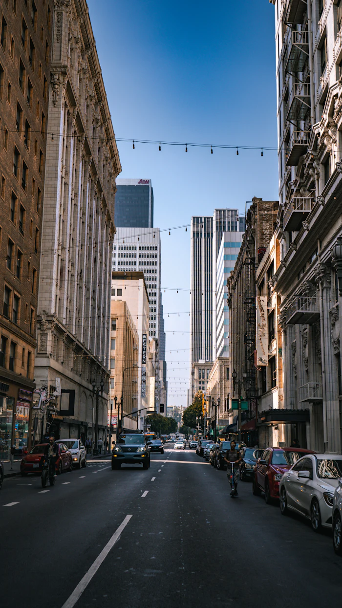 A downtown street lined with tall buildings