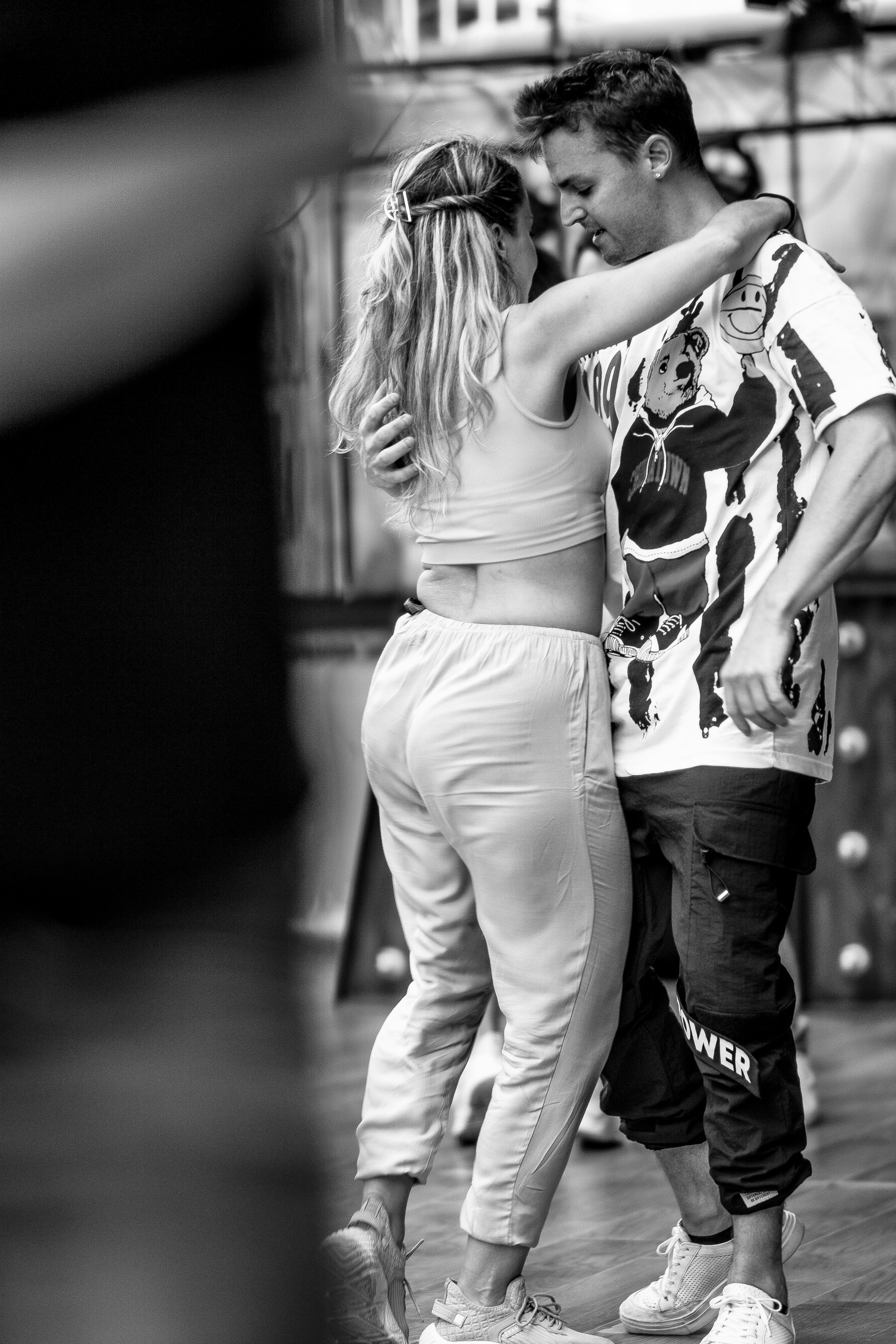 A man and a woman standing next to each other