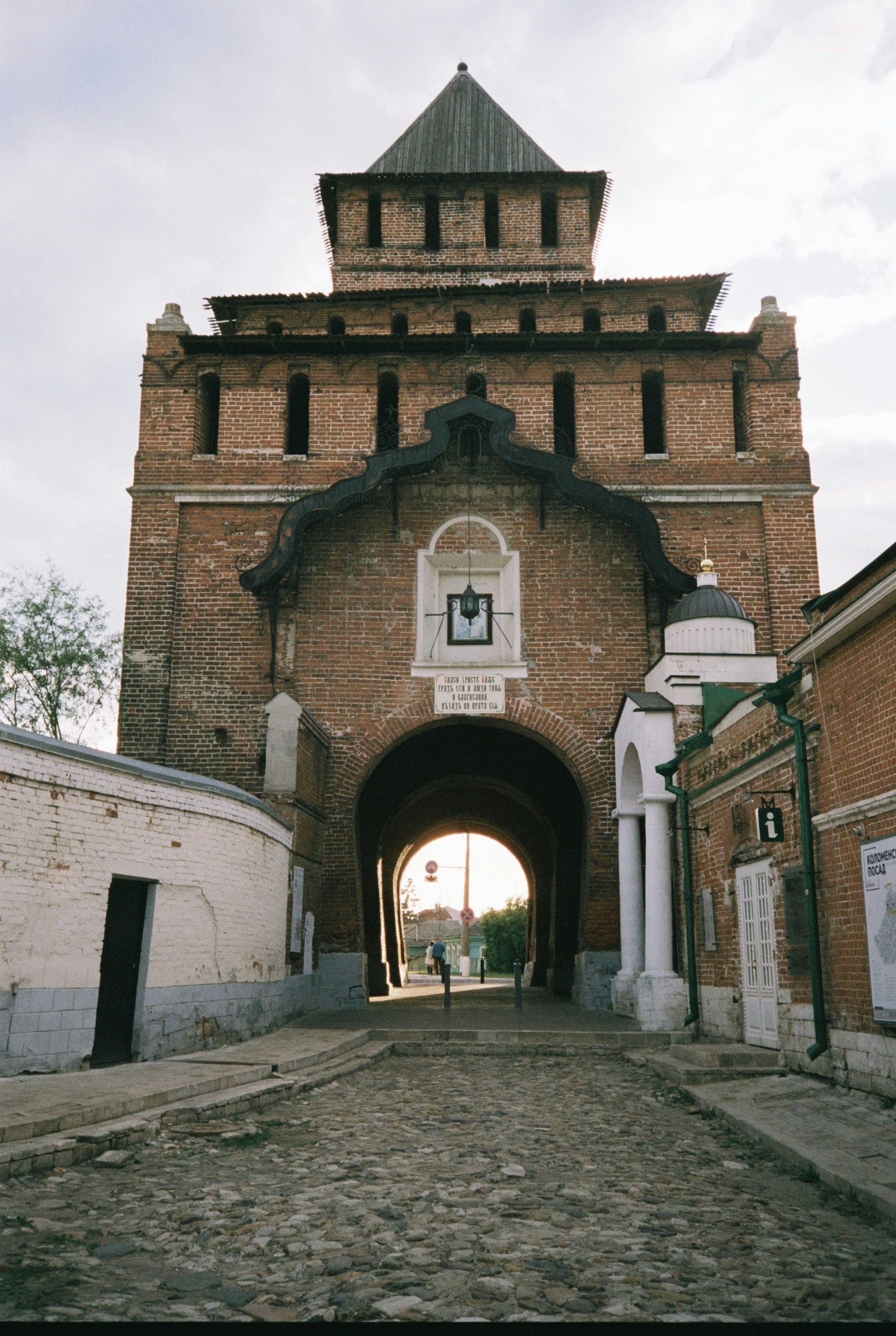A large brick building with a clock tower on top of it