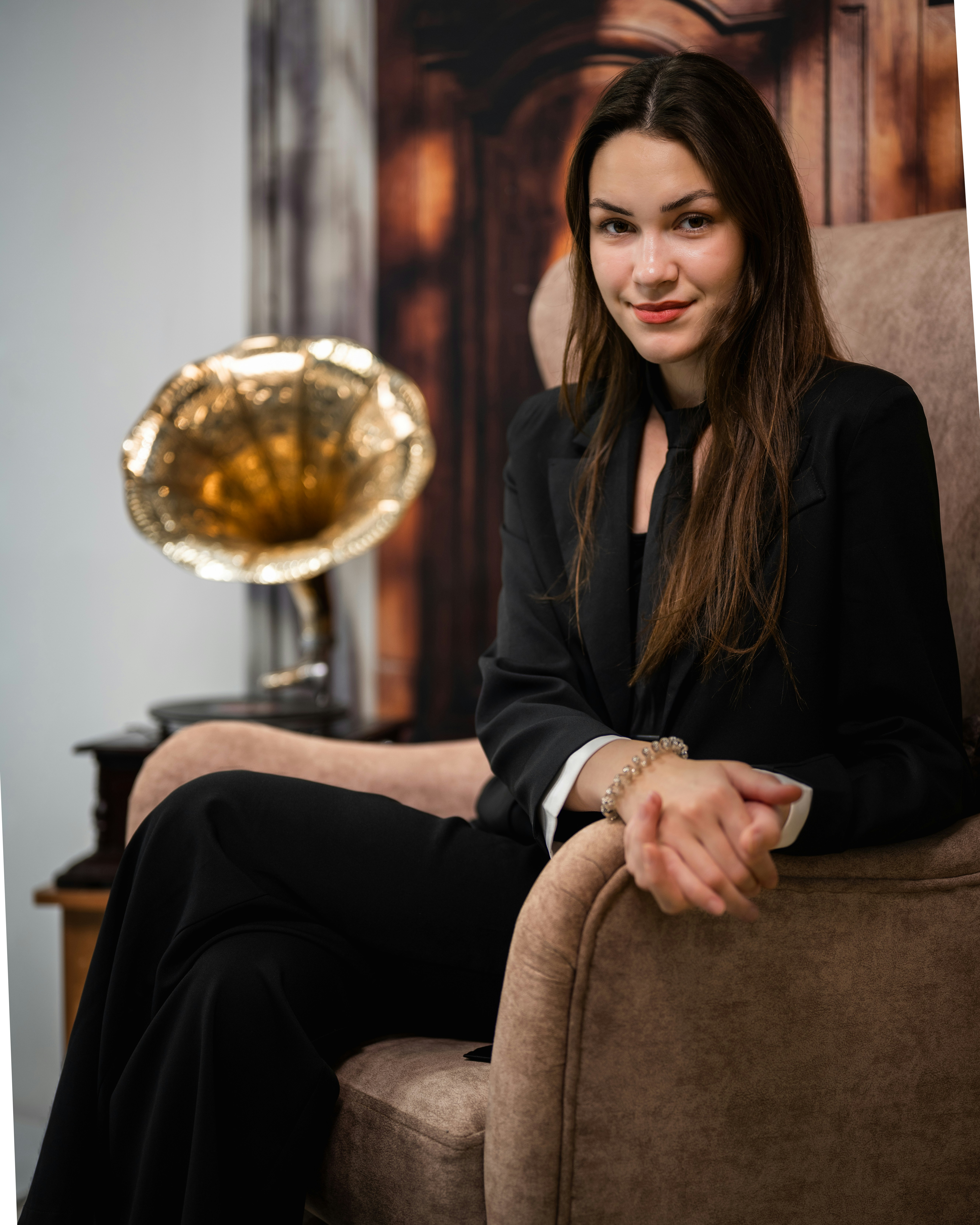 A woman sitting in a chair in a room