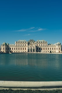A large building sitting on top of a large body of water