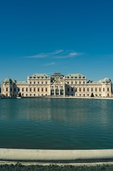 A large building sitting on top of a large body of water