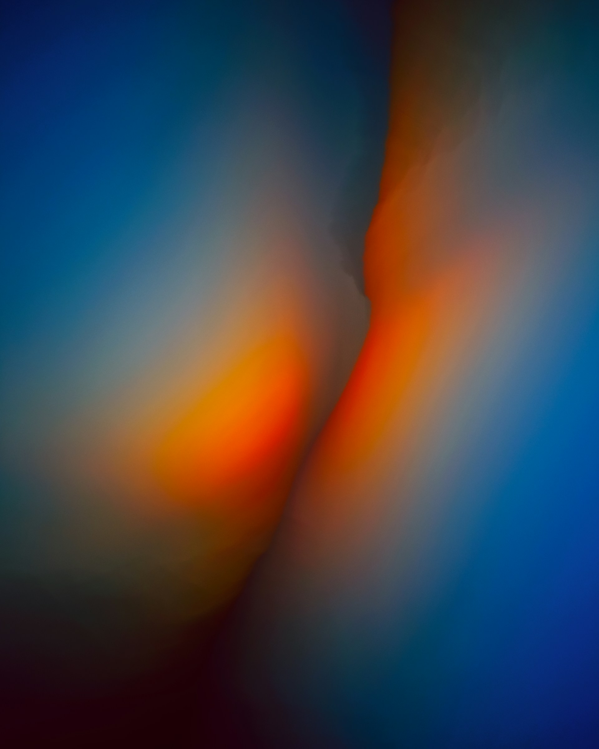 A blurry image of a person's face