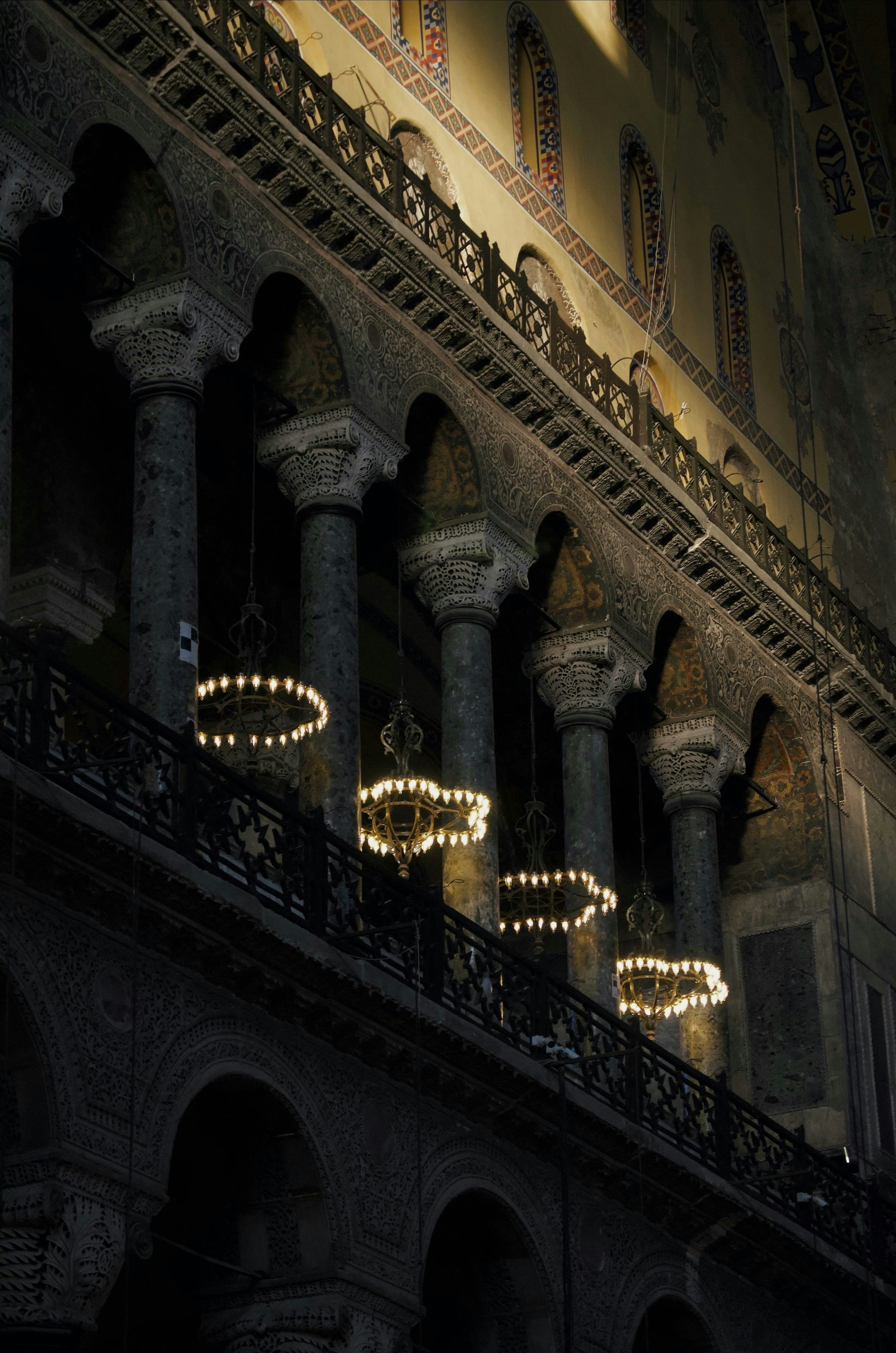 A chandelier hanging from the ceiling of a building