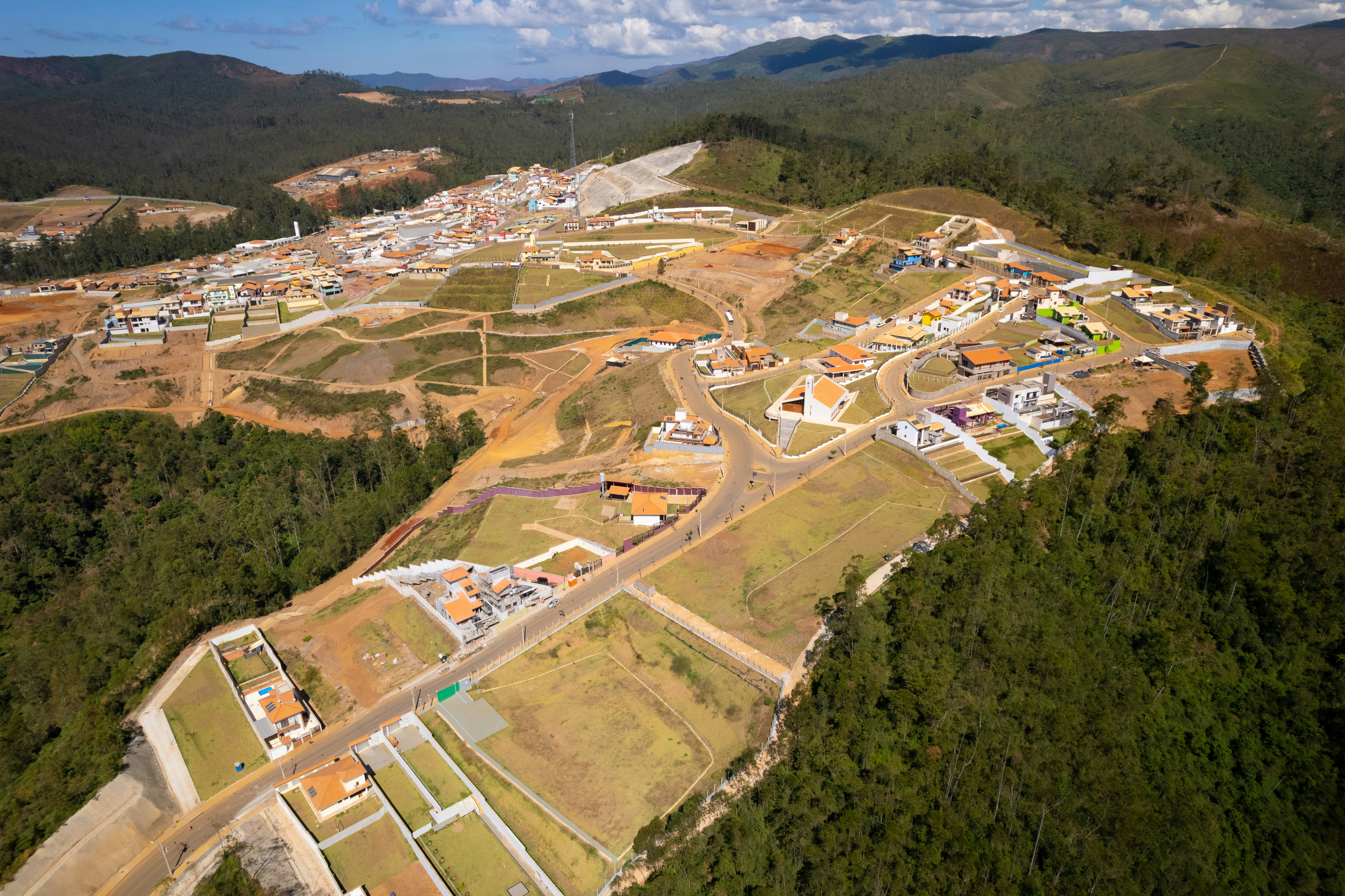 An aerial view of a city in the mountains