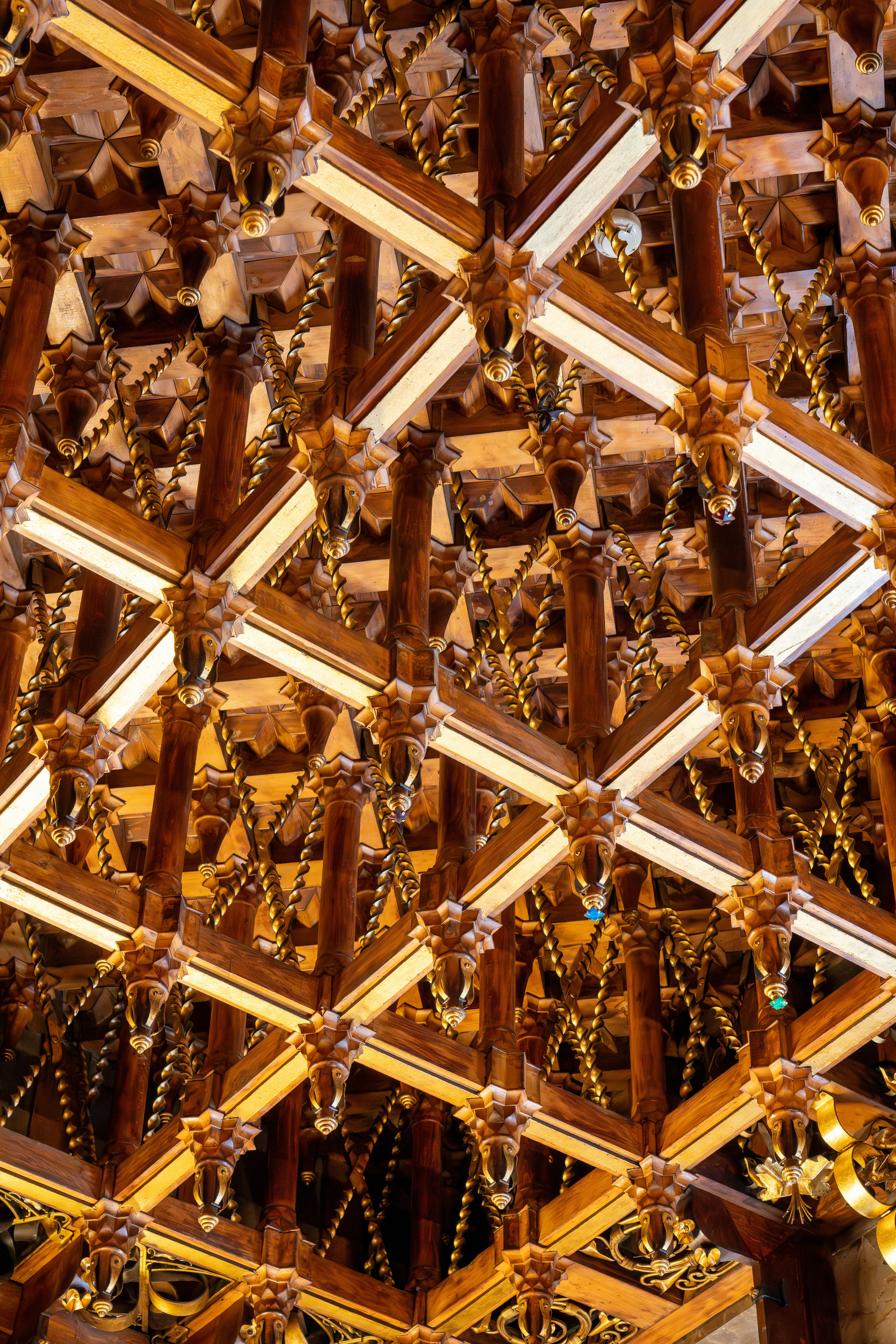 A wooden structure with a clock on the top of it