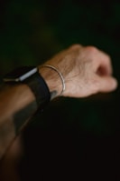 A man's arm with a wrist watch on it