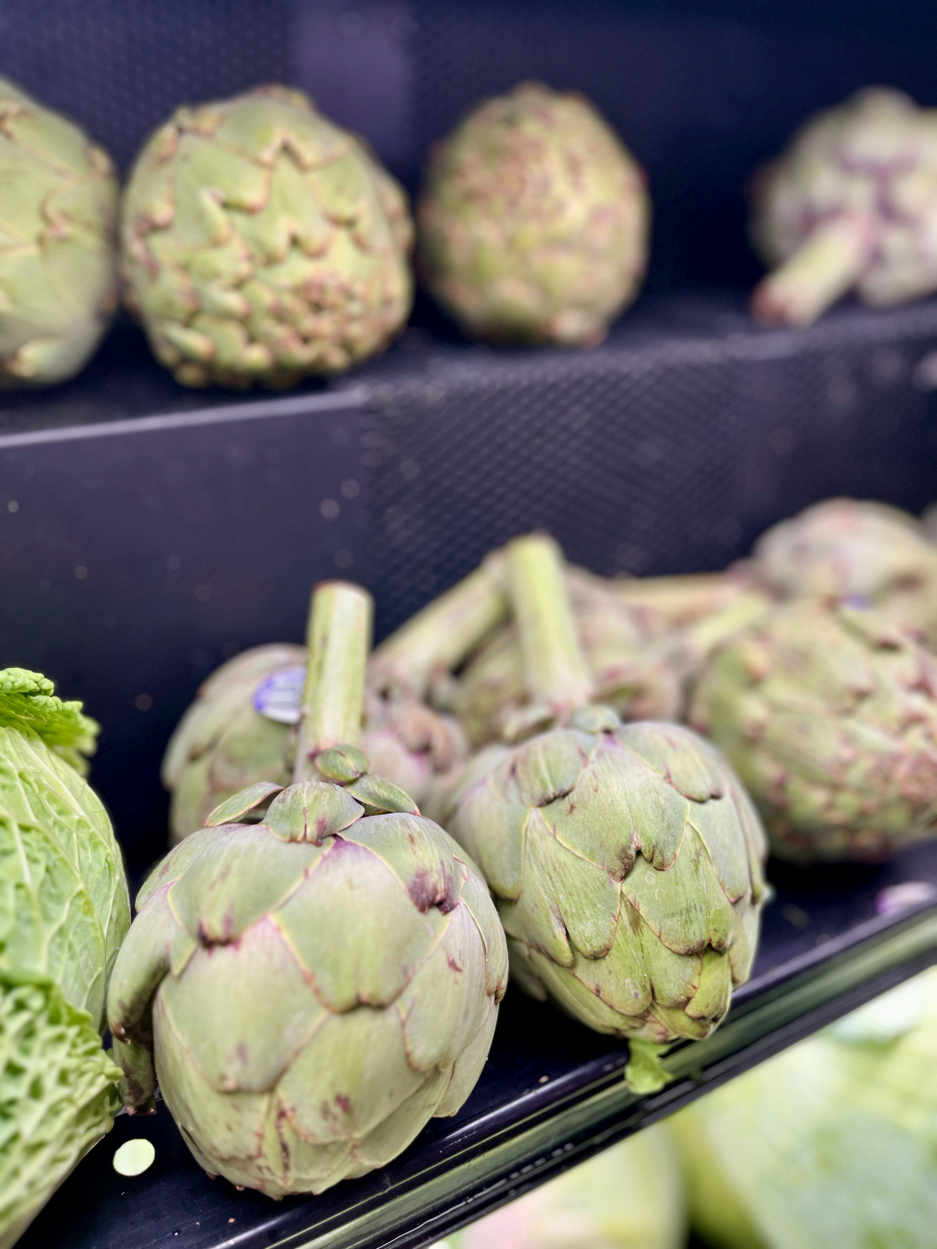 person wearing grey knit sweater