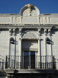 A building with a balcony and balcony railing