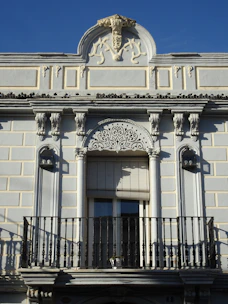 A building with a balcony and balcony railing