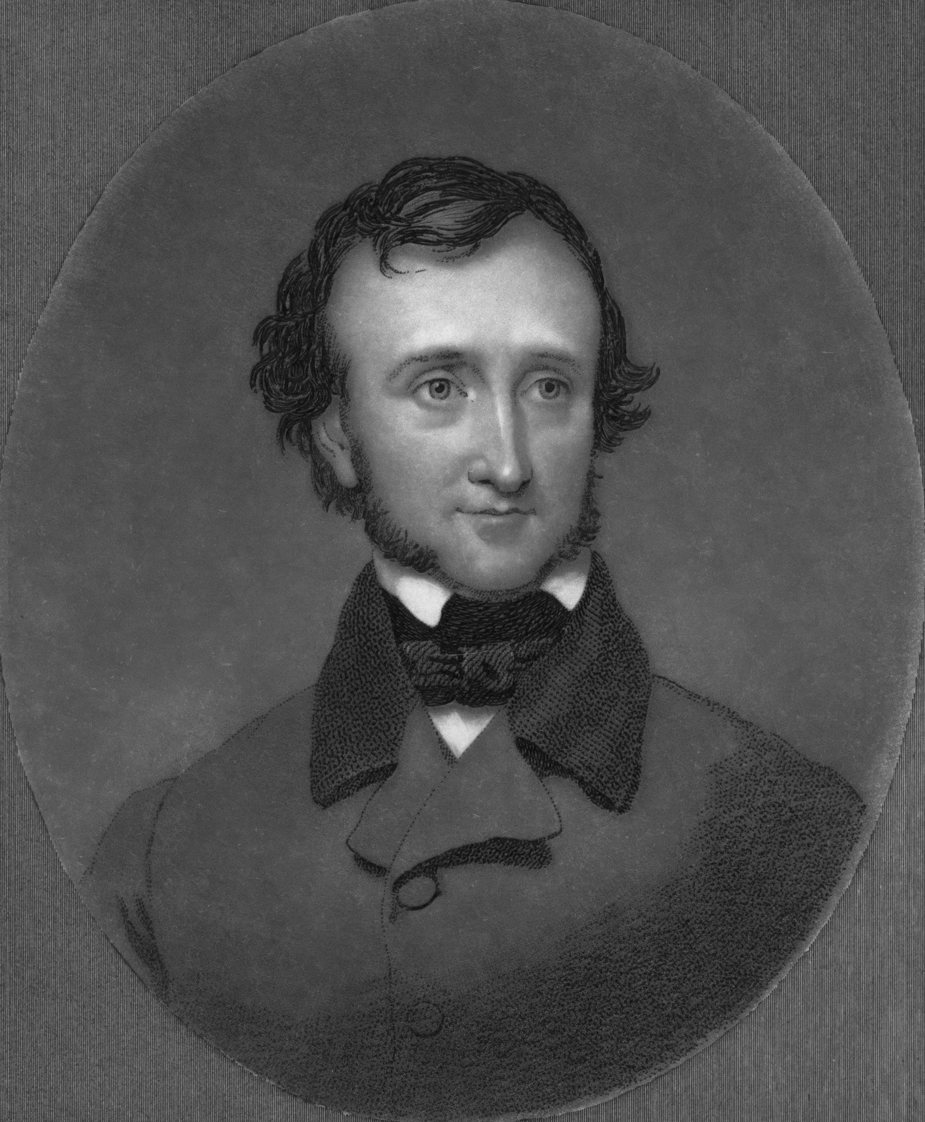 Portrait of a man with dark hair and beard.