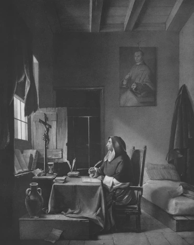 A nun writing at a desk in a monastic cell.