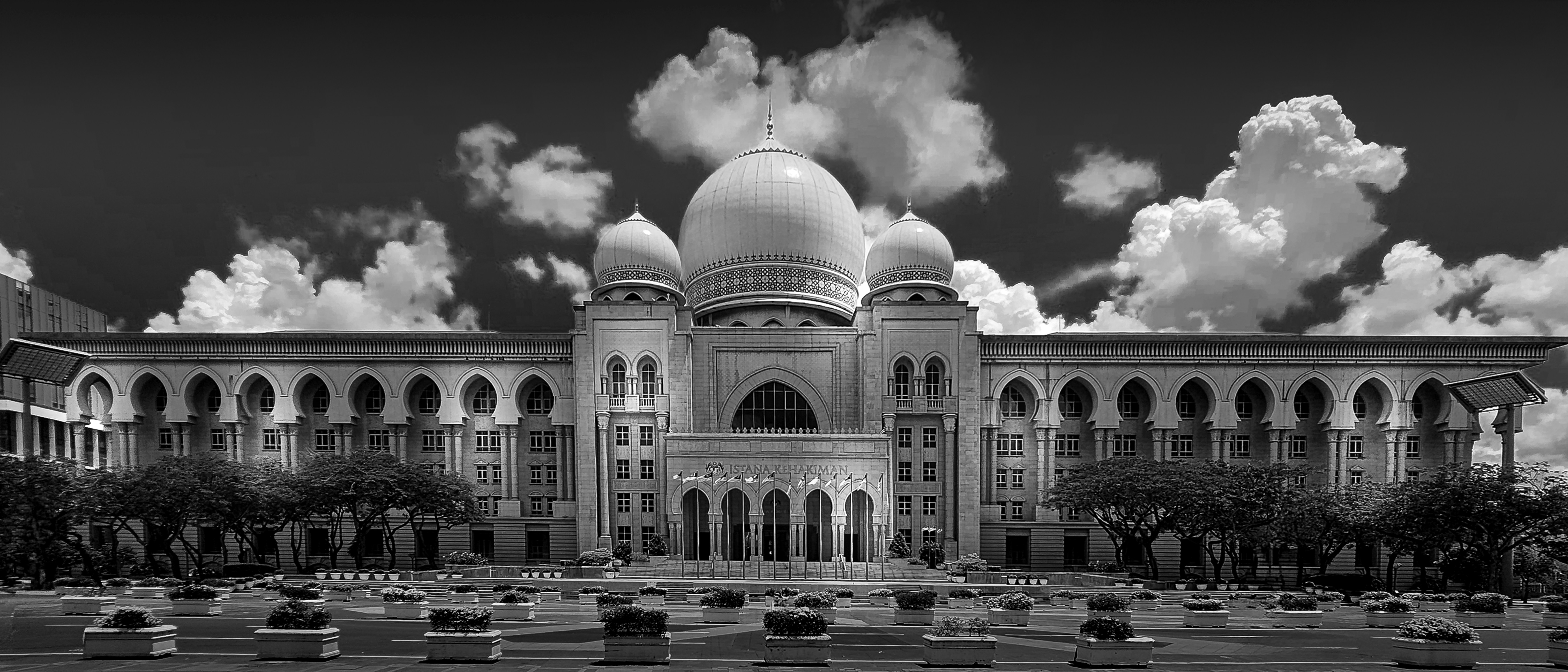 A black and white photo of a large building