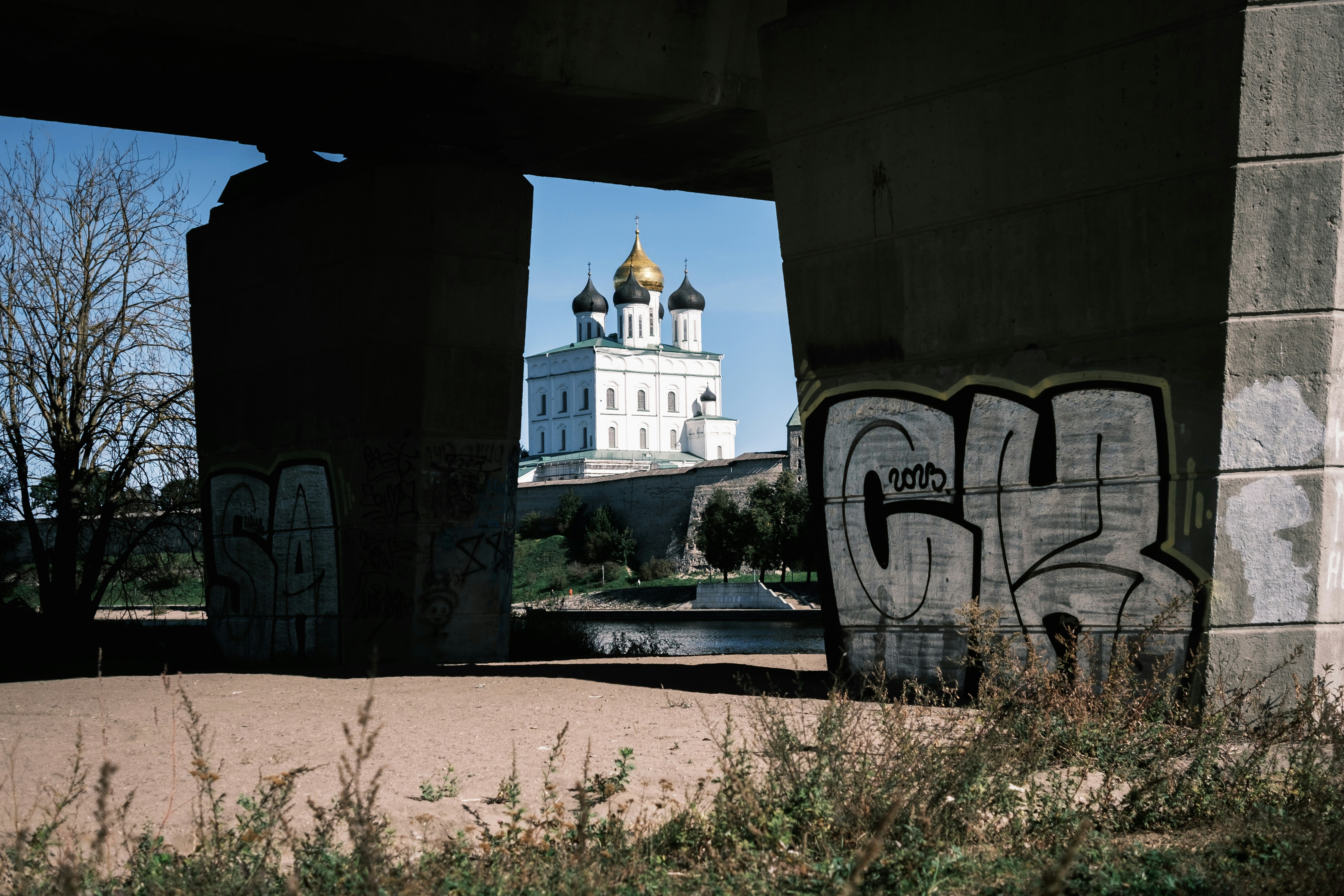 A view of a building with graffiti on it