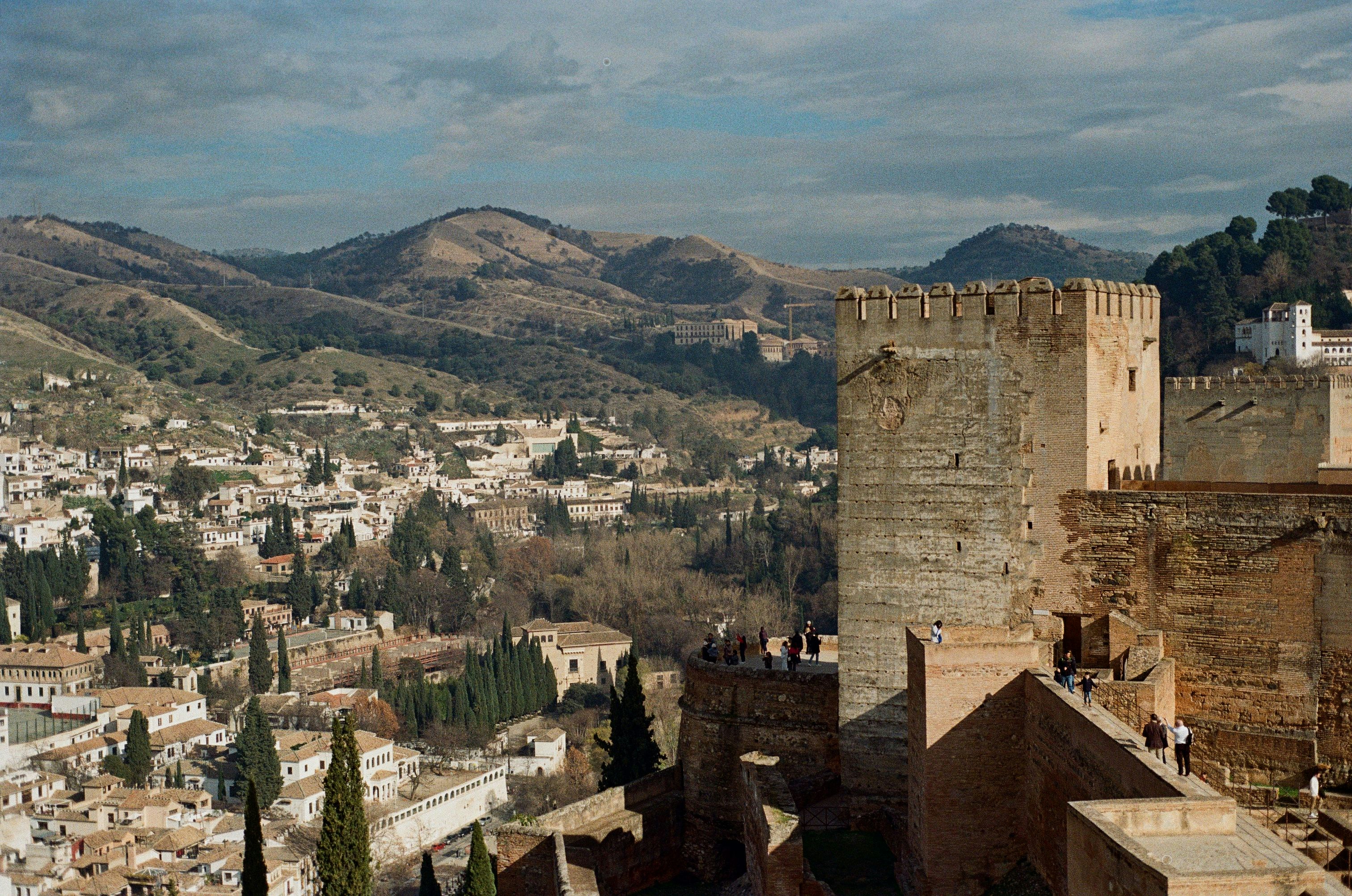 A view of a city with mountains in the background