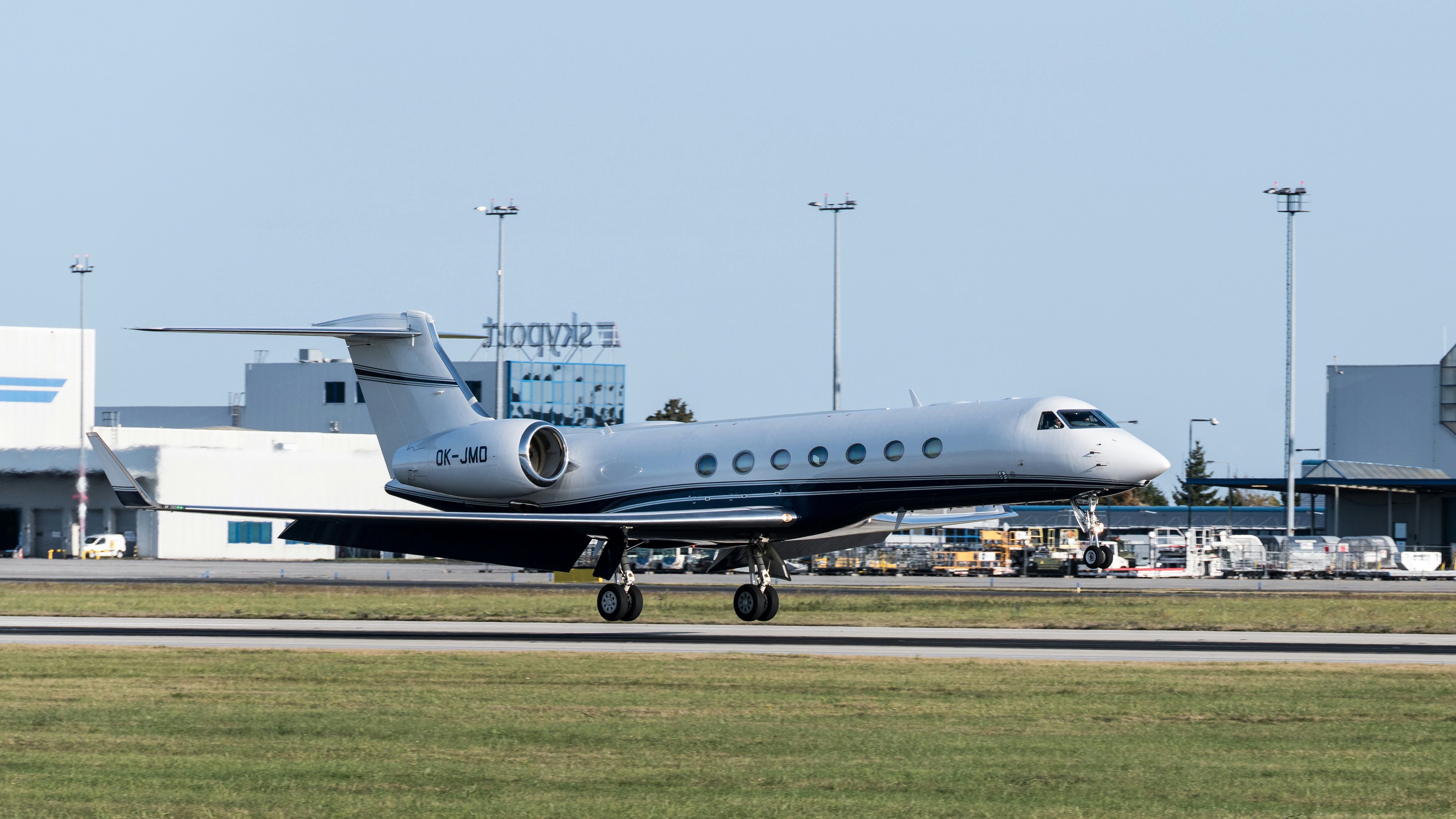 An airplane is taking off from an airport runway