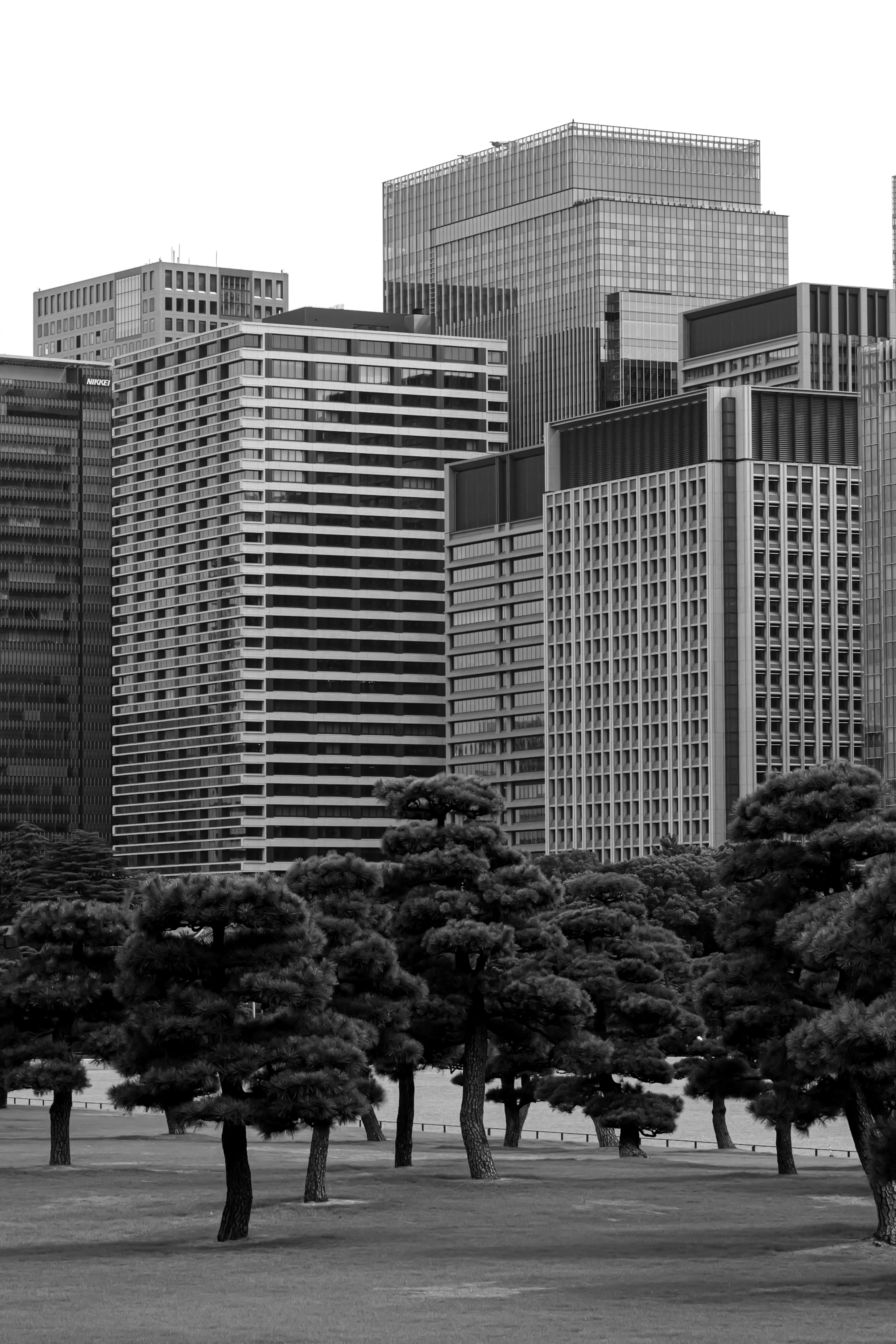 A black and white photo of a city skyline