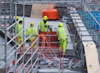 A group of construction workers working on a construction site