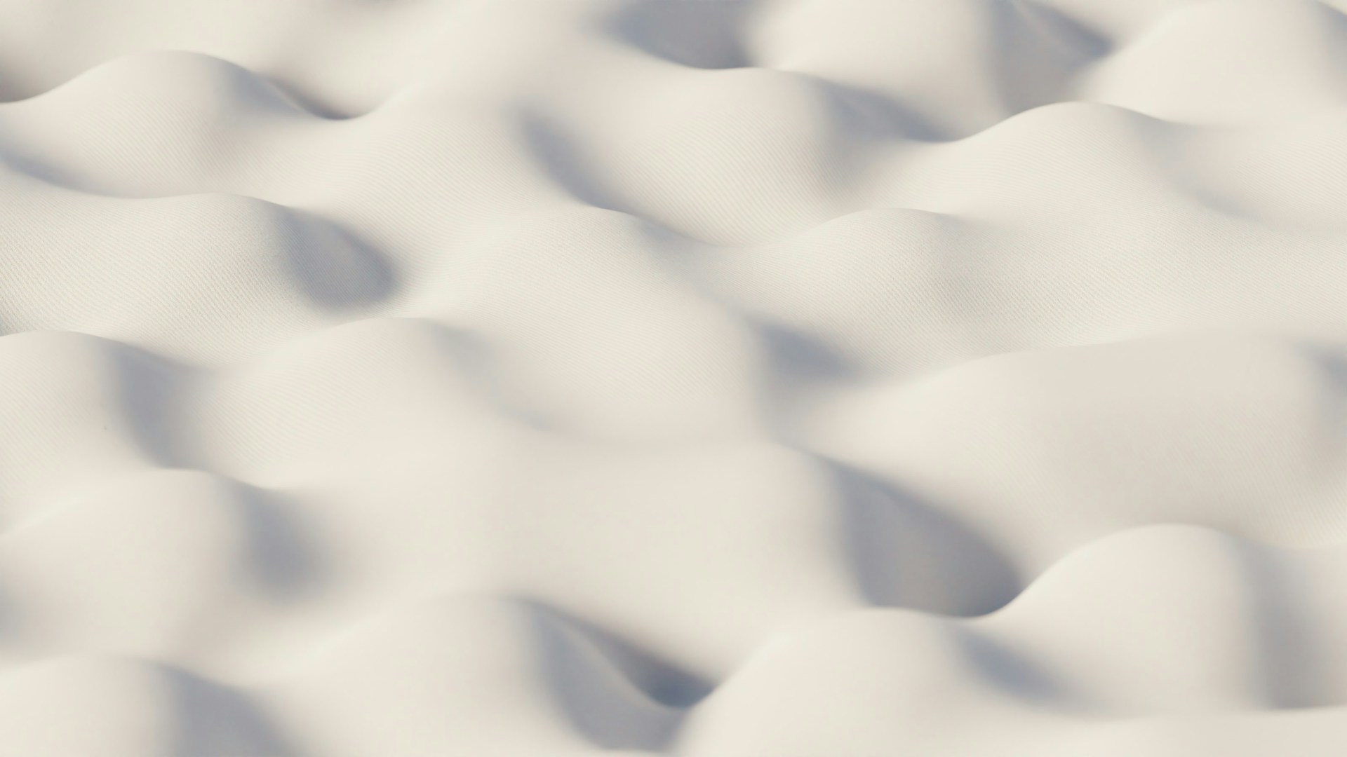 A blurry photo of a snow covered ground