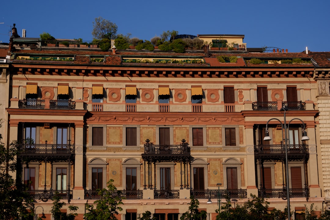 An old building with balconies and balconies on top,
