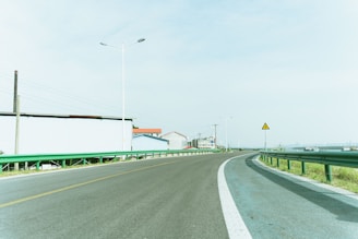 A view of a highway from a car's windshield