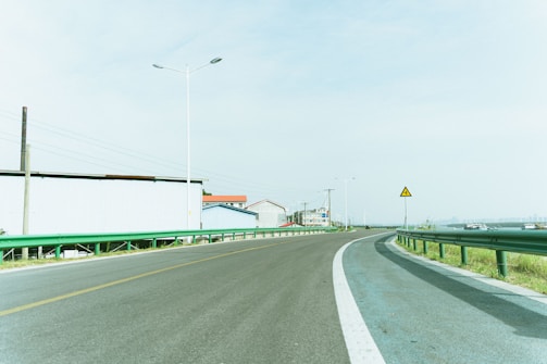 A view of a highway from a car's windshield