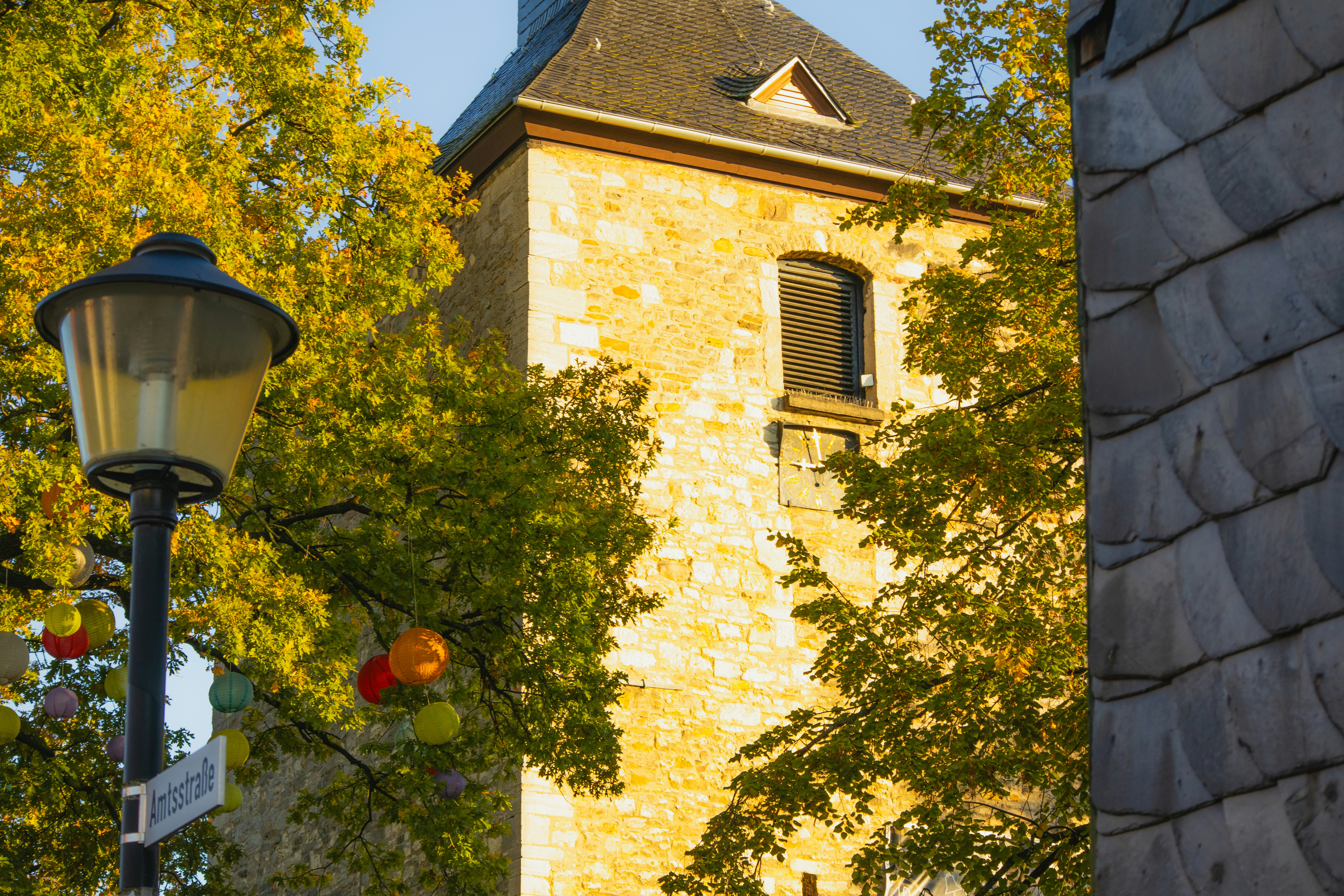 A tall tower with a clock on the top of it