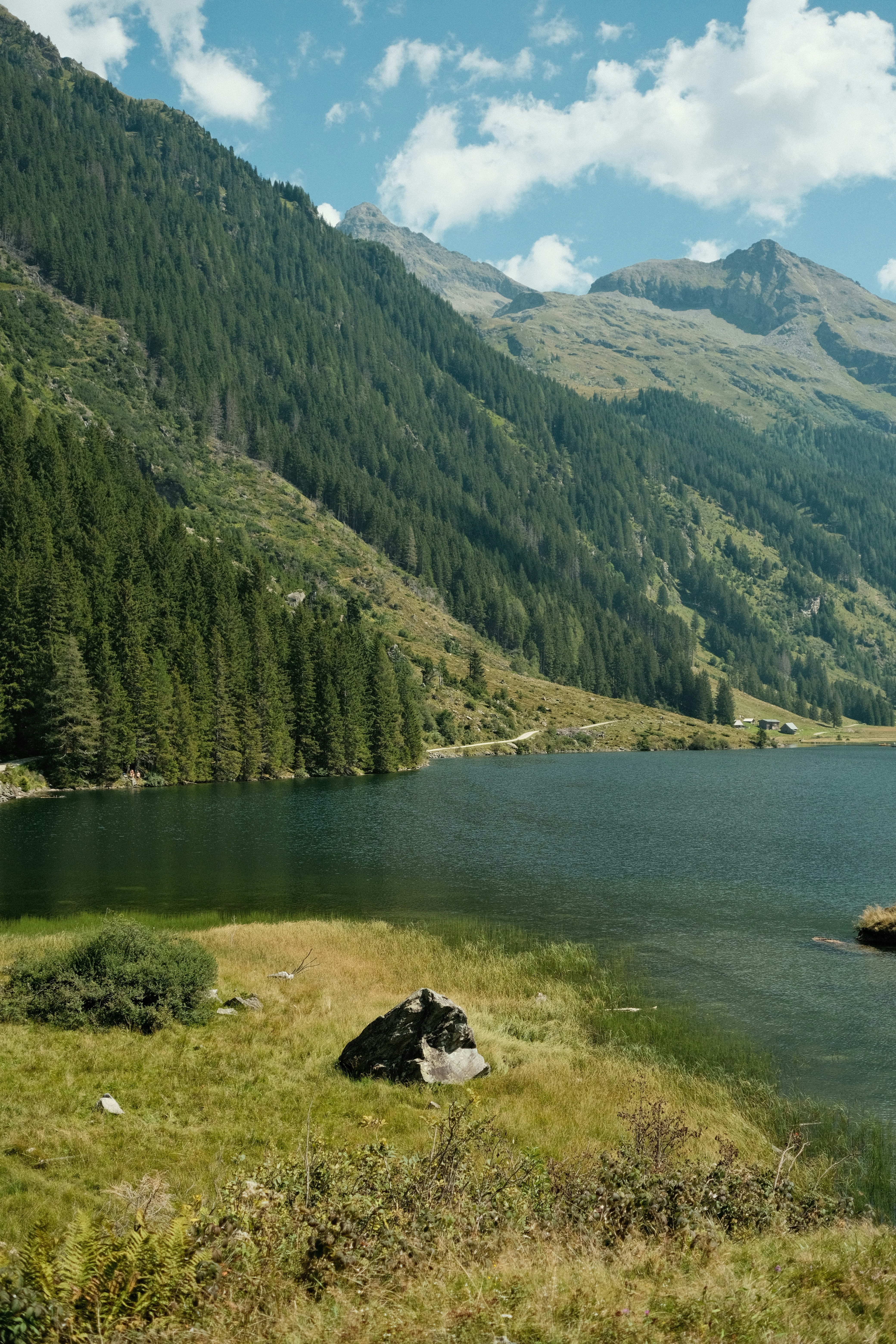 A large body of water surrounded by mountains