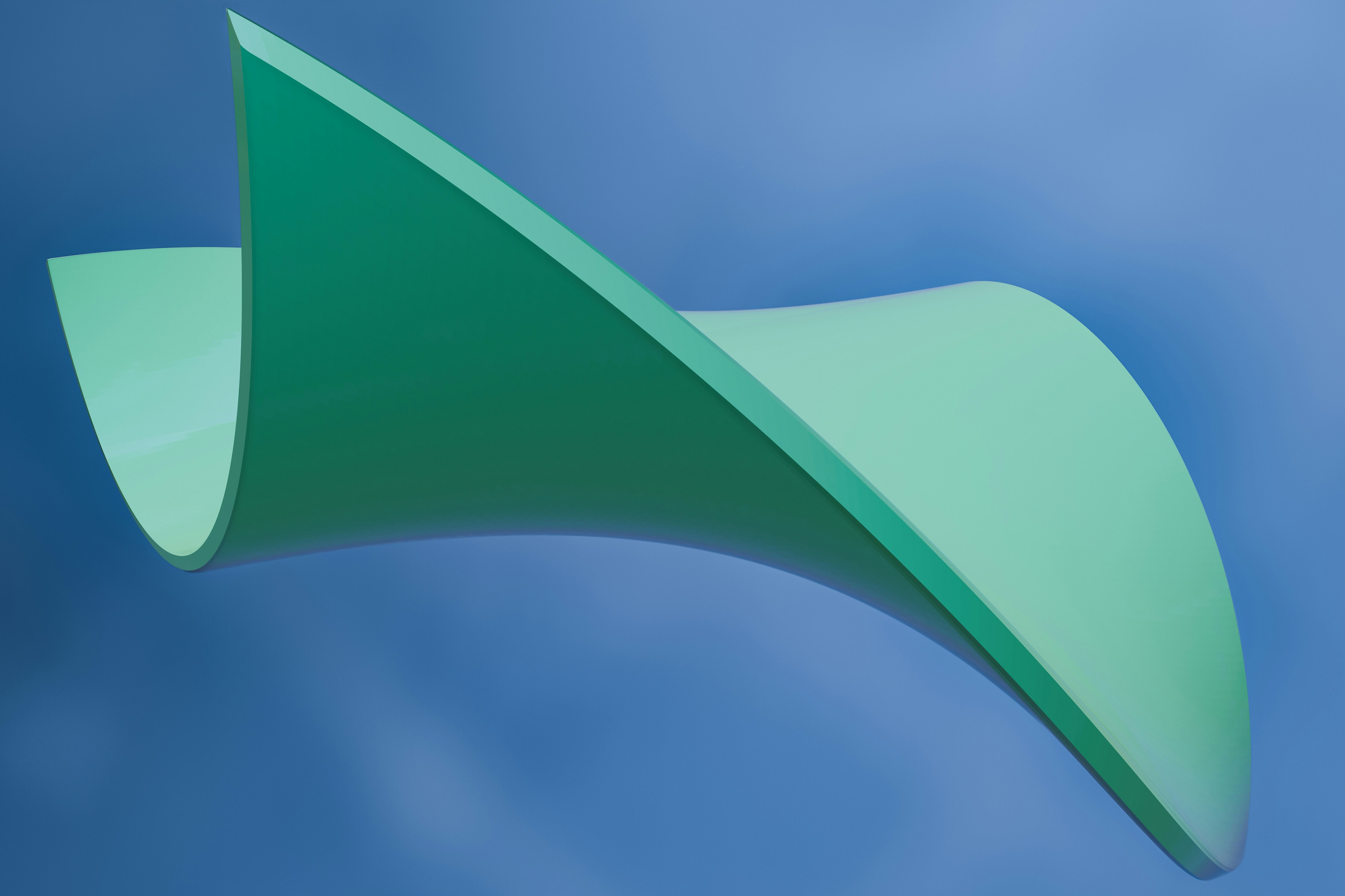 Un objet incurvé vert volant dans le ciel