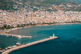 An aerial view of a city next to a body of water
